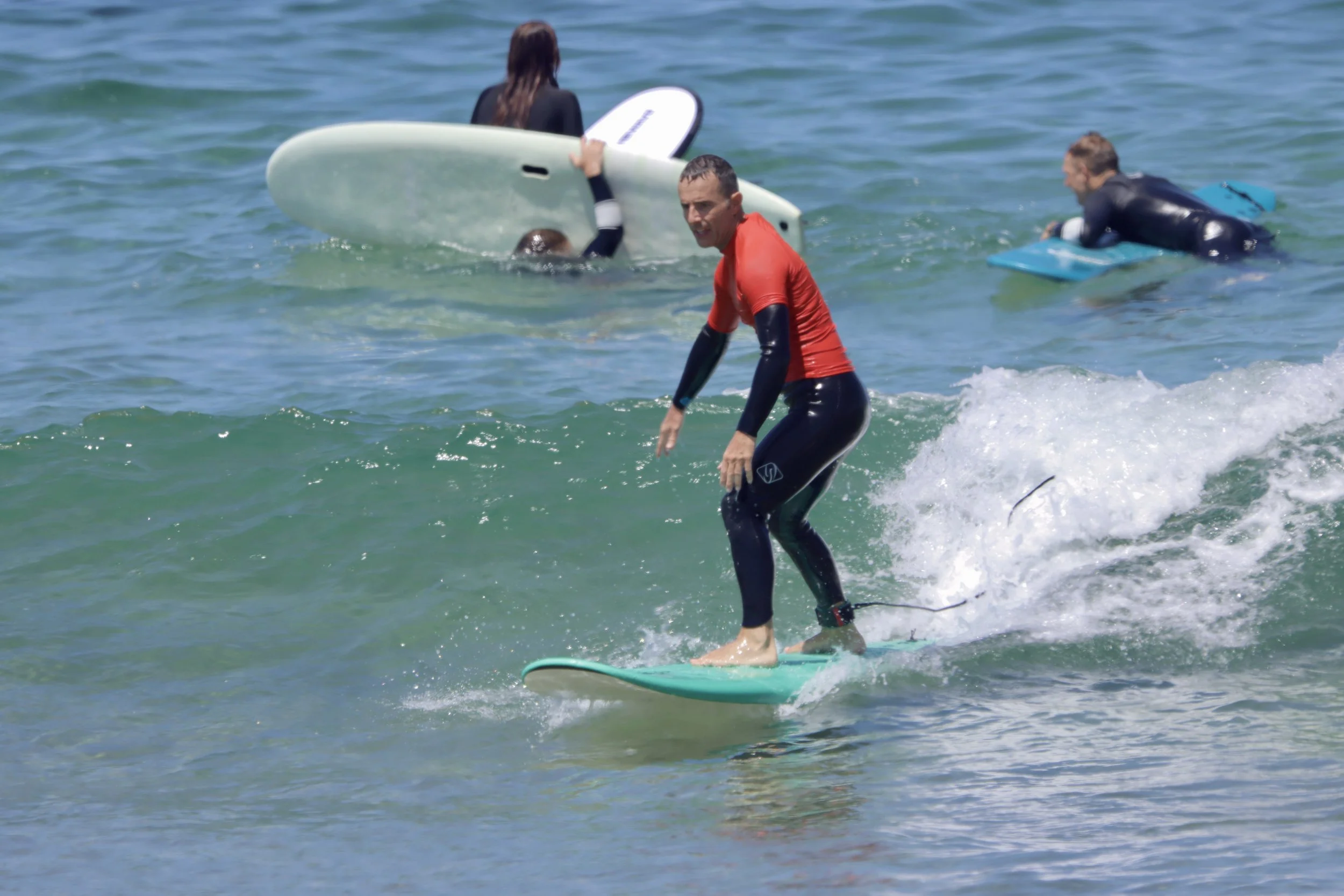 An improver surfer learning to surf green waves consistently at Crocros, Tamraght, Morocco