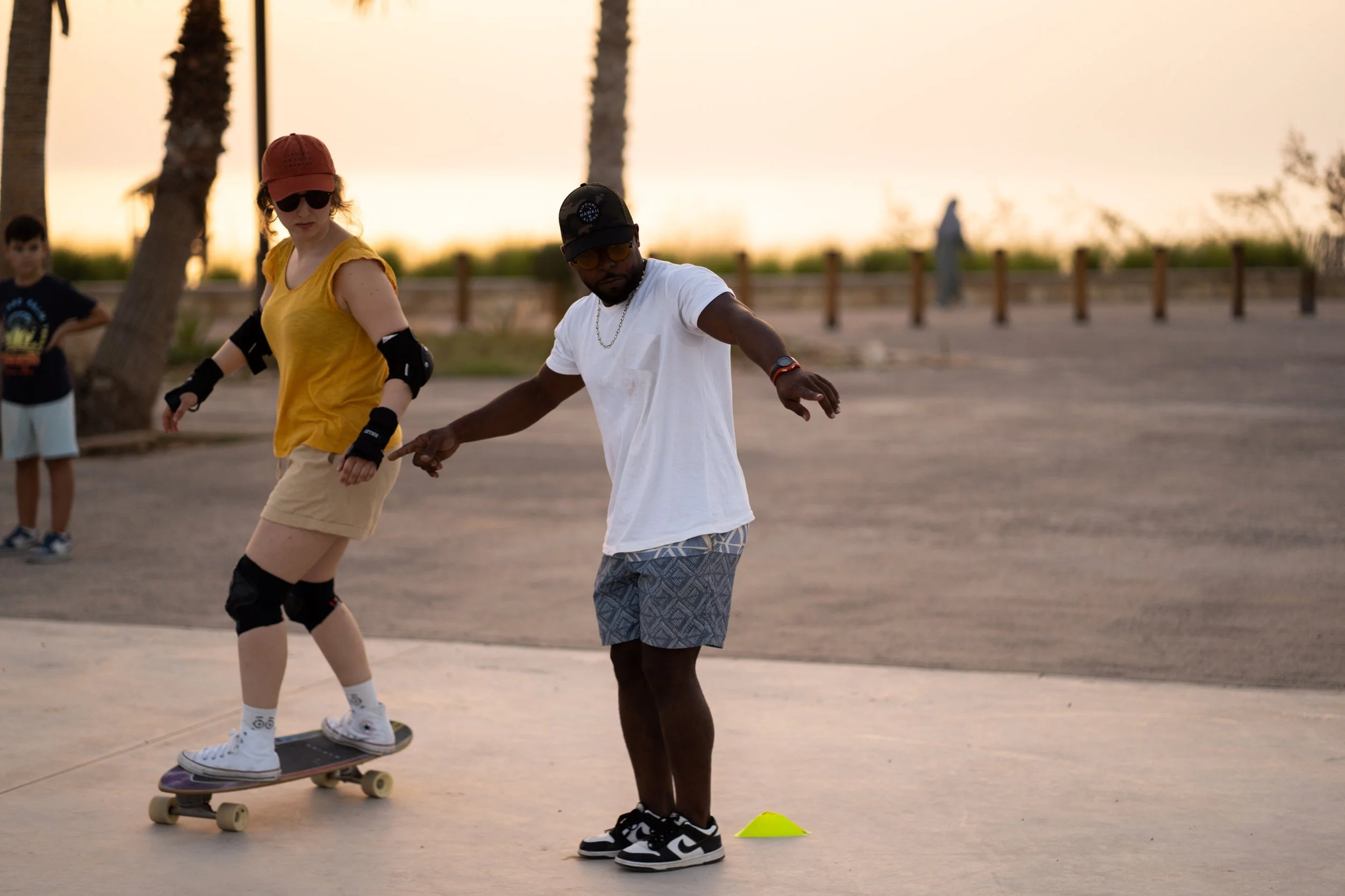 Ayoub, Local Surf Maroc surfskate coach at K17, Taghazout, Morocco, giving a beginner surfskate lesson.