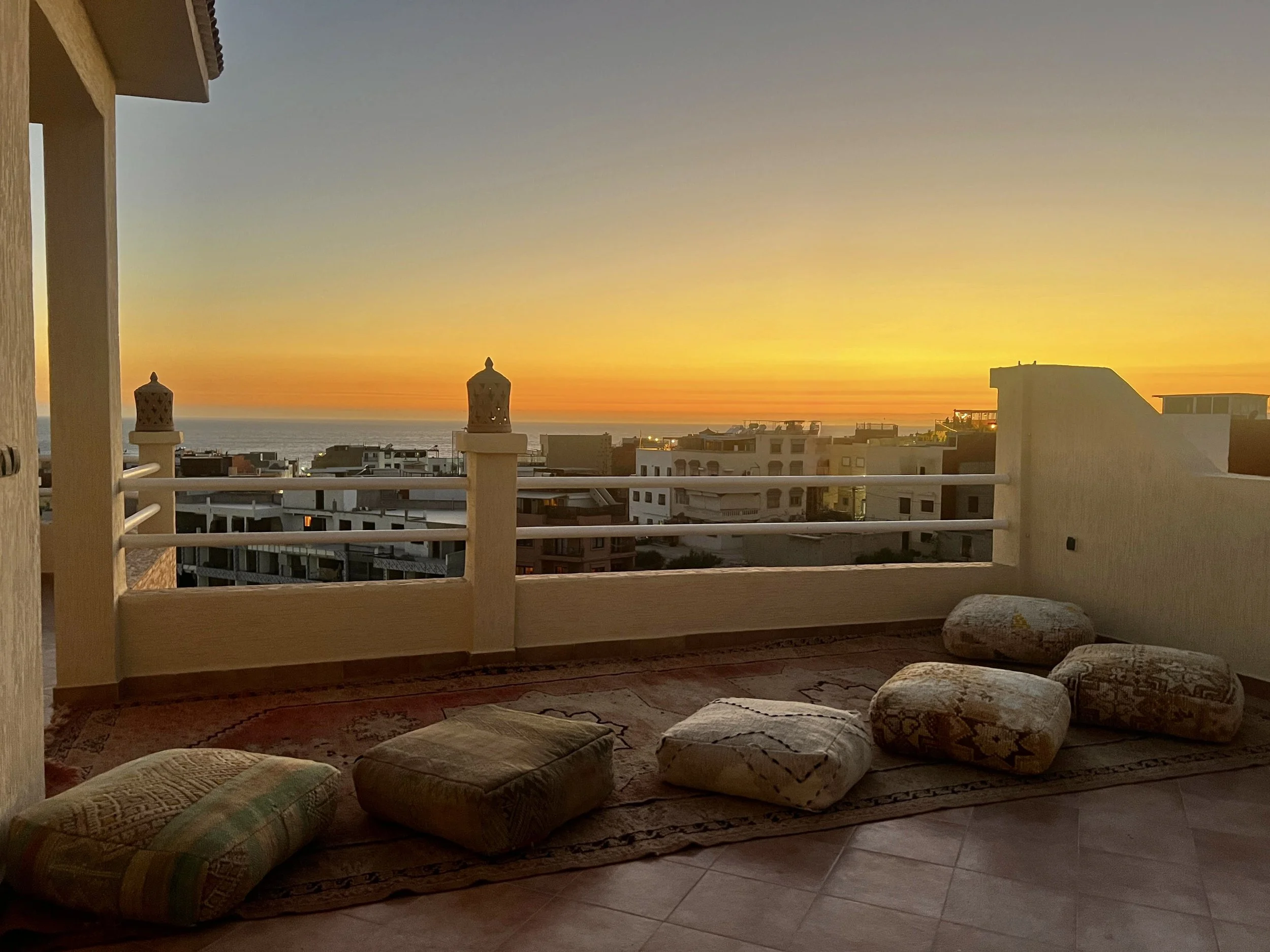Sunset view of Tamraght and the Atlantic Ocean from the Surf Villa's terrace, Morocco.