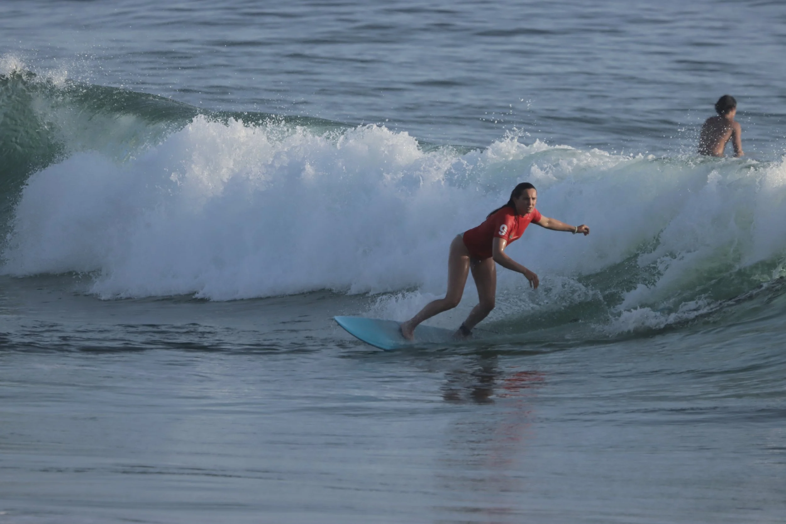 Advanced Intermediate surfer on summer waves at Devil's Rock, Taghazout, Morocco