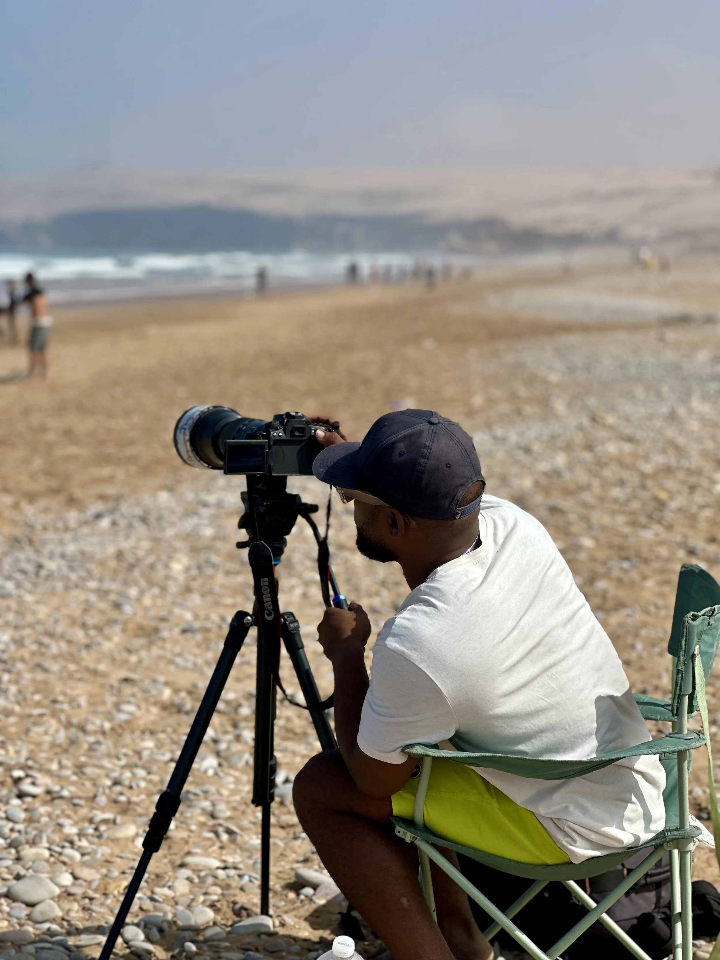 One of our Local Surf Maroc photographers at Tamri capturing footage for video analysis at the Surf Villa, Morocco.