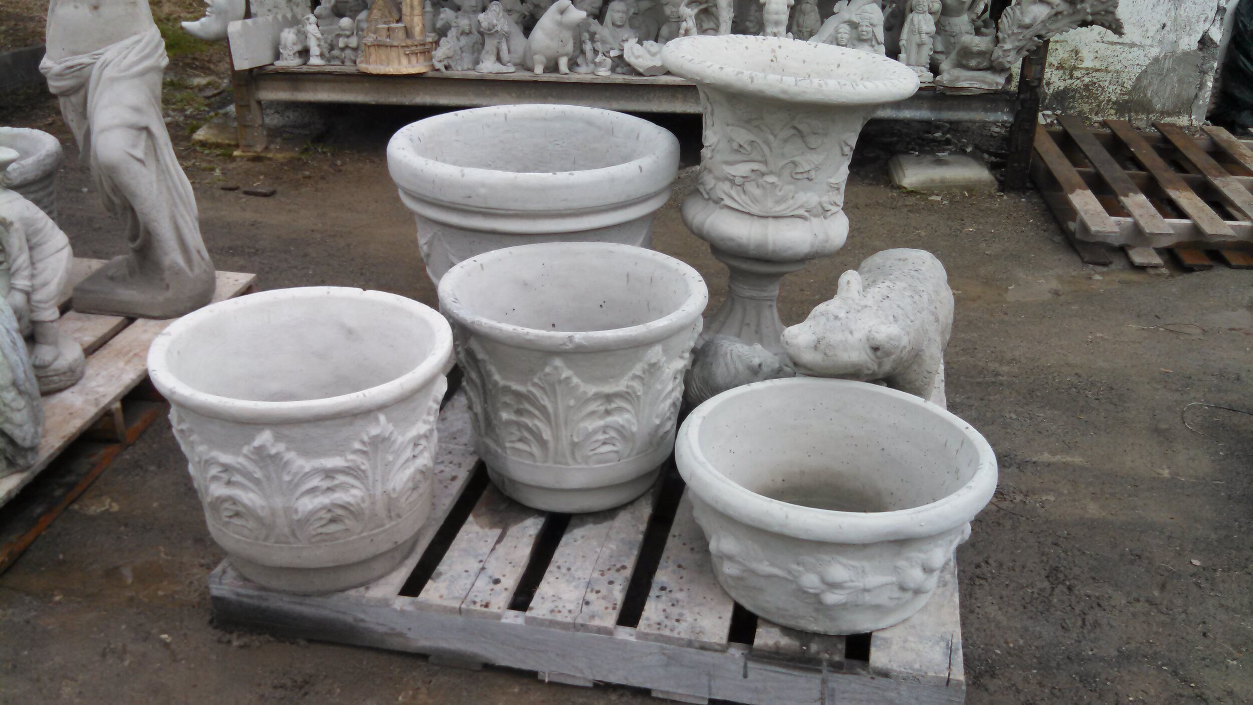 concrete urns with bear.jpg