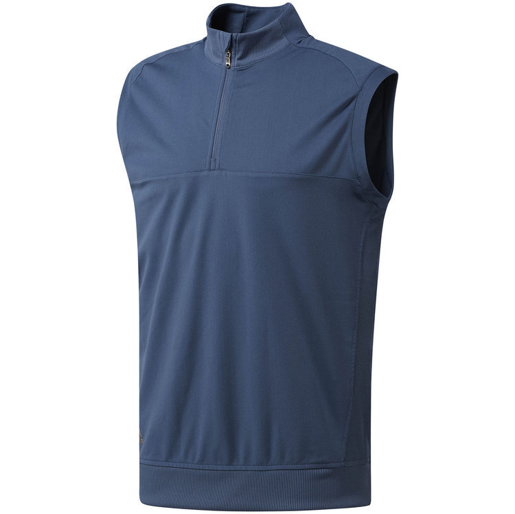 Strut the fairway in style with this men's golf vest. Soft stretch cotton provides comfort and full range of motion as you drive the ball down the fairway. A half zip and stand-up collar lets you adjust your coverage, and an Adidas Badge of Sport si…