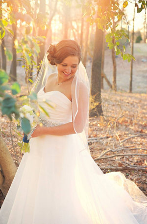 Girl in wedding dress at River Landing