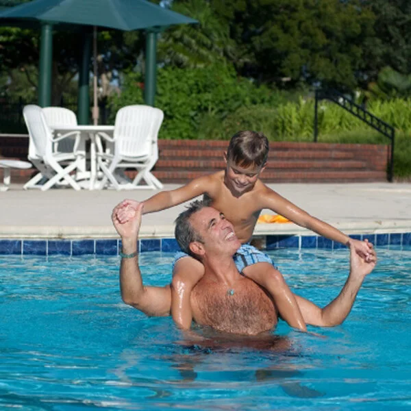 River Landing Pool with Father and Son