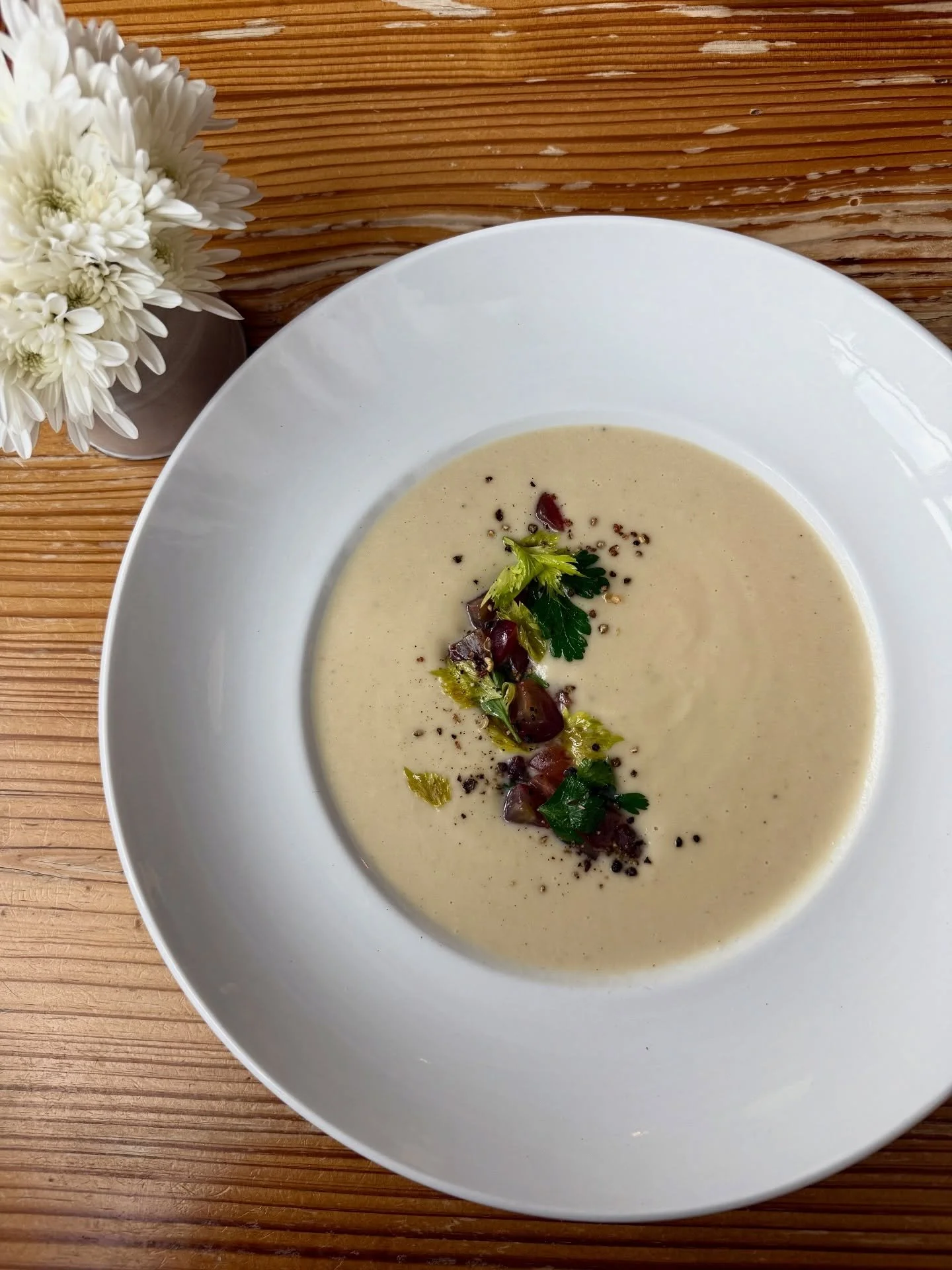 Feel a chill in the air?🧣🍁Celeriac Soup is the answer. 

Vegetarian, gluten-free, and perfect with a salad or sandwich &mdash; available by the bowl (pictured here) or cup, at lunch and dinner.