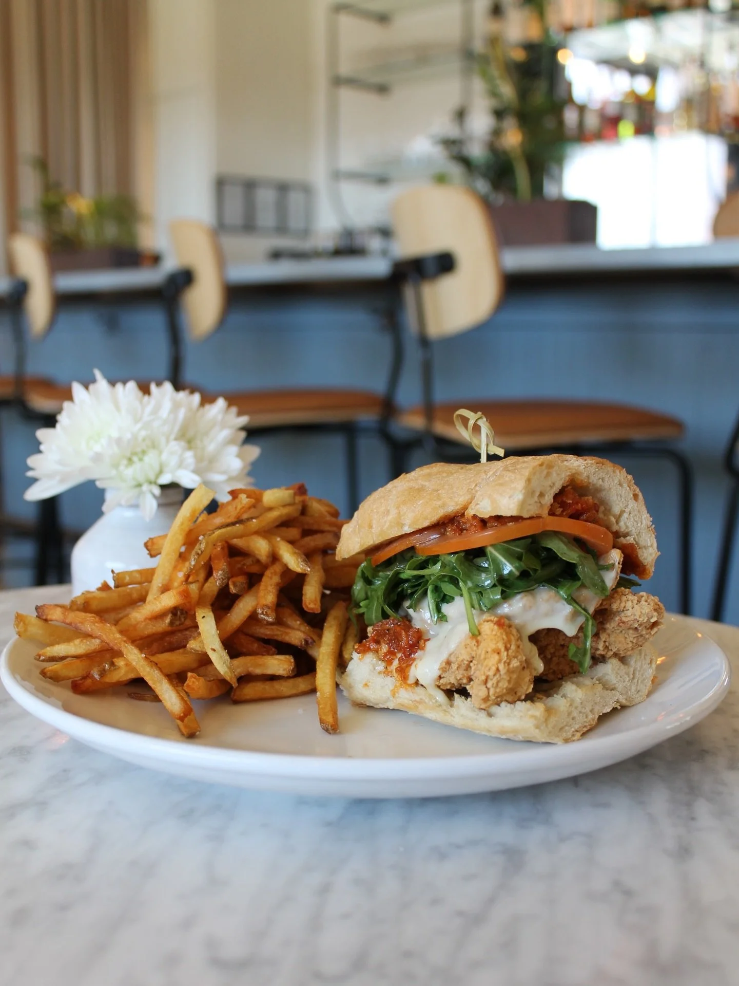 Lunch deserves some love... and who doesn&rsquo;t love fried chicken?

📸 FRIED CHICKEN SANDWICH &bull; provolone, tomato, arugula, basil, citrus vinaigrette, sun-dried tomato &amp; Calabrian chili pesto on toasted French bread