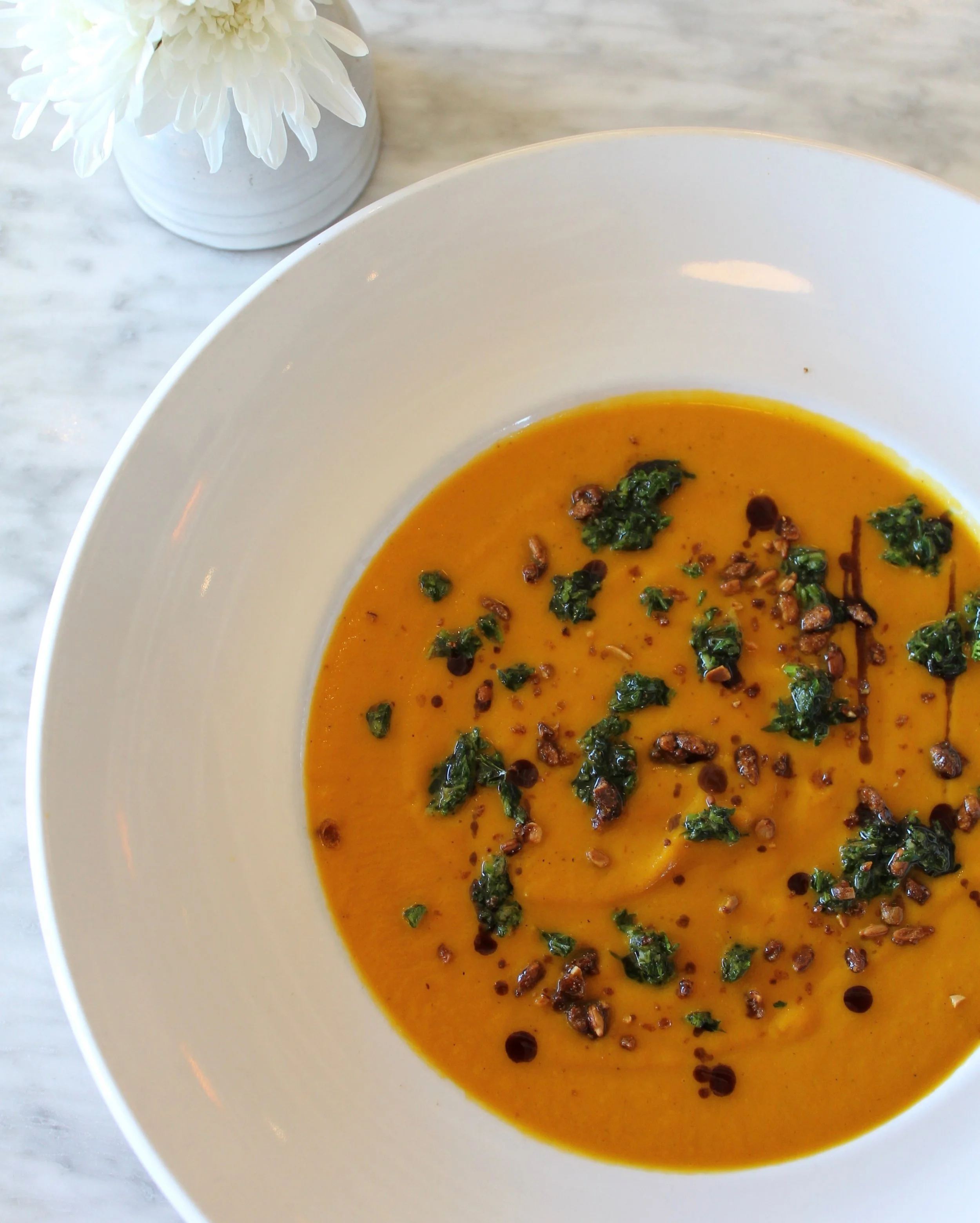November is around the corner, which means soup season is calling. 🥣

Introducing our Spiced Carrot Soup | carrot top gremolata, candied sunflower seed, and pumpkin seed oil (gluten free &amp; vegetarian)

Pairs perfectly with either of our salads f