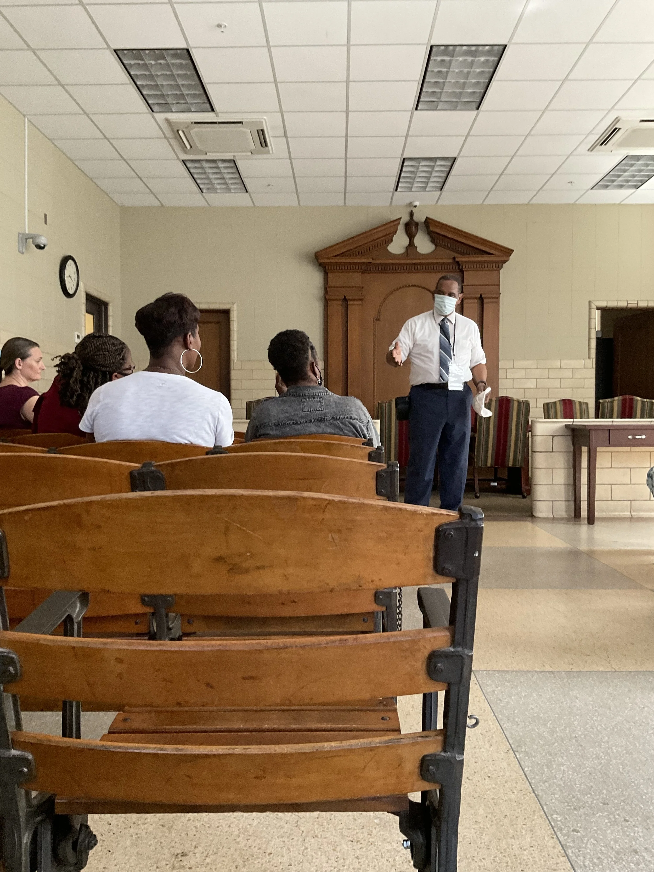 Historian Dr. Richard Bailey speaks to teachers in the courtroom at City Hall where the arraignment of Rosa Parks took place in 1955.