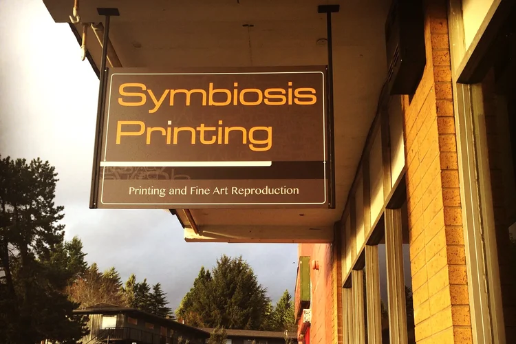 Symbiosis+Outdoor+sign+in+the+sunset