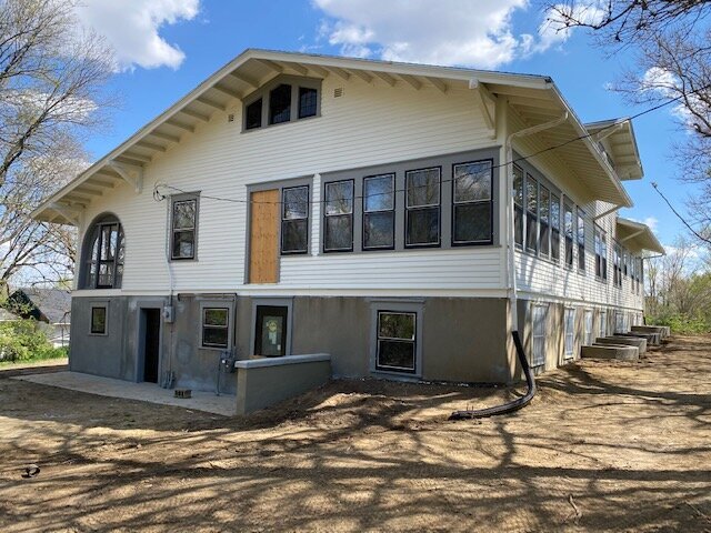 In the back, the blank door will lead to a future deck with stairs to the grounds. The site is to be seeded by&nbsp;Kinghorn Gardens&nbsp;late May, early June.