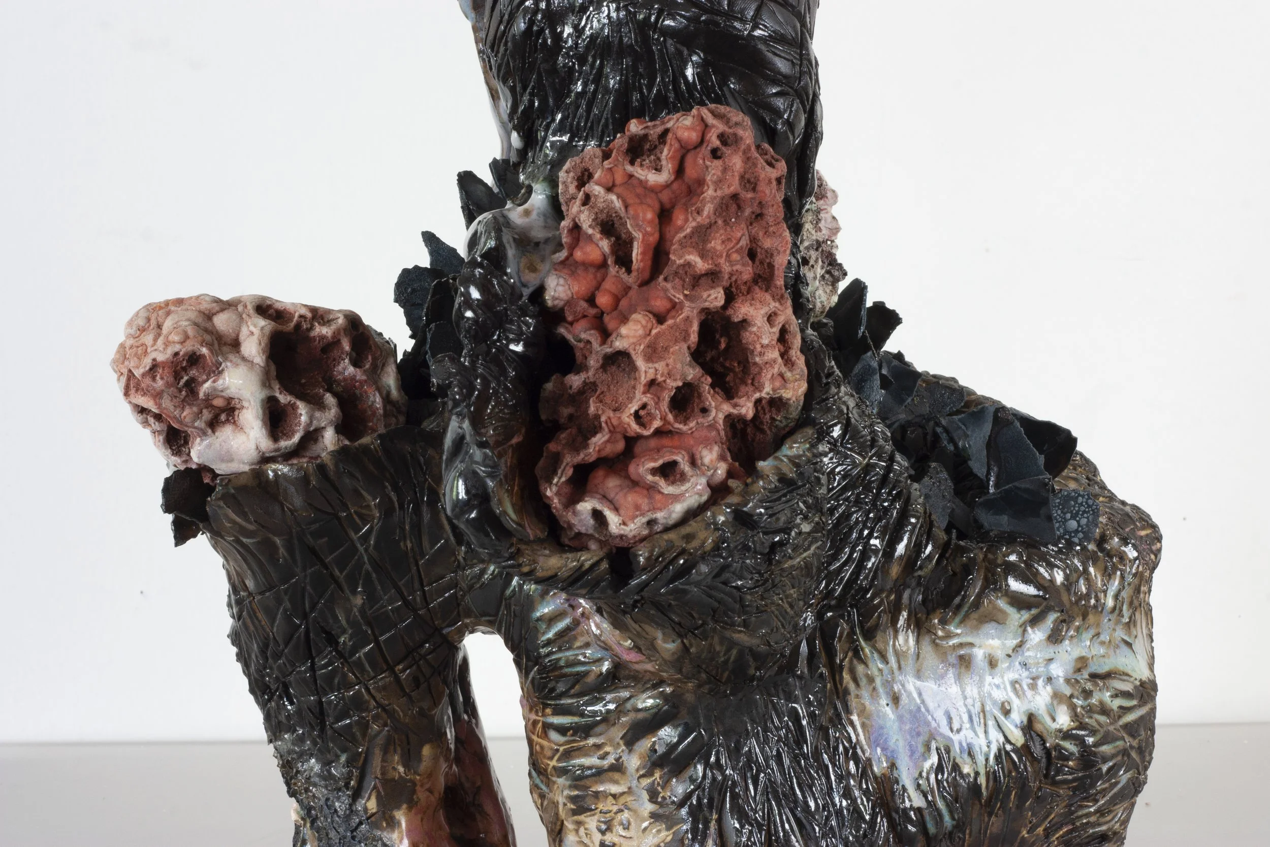 "Scorpion Mother," 2023. Serrated black stoneware, underglaze, crushed steel glaze, melted steel chips, Huzzah Valley found rocks, studio detritus, glaze.