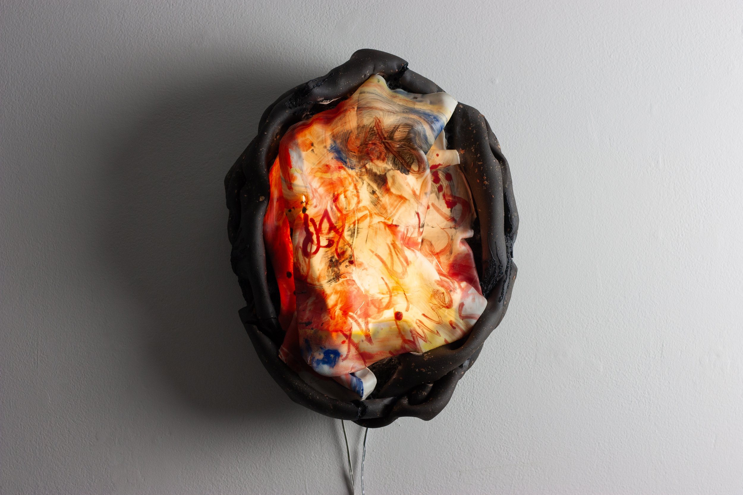 'At the edge of the known universe,' 2025. Stoneware, mica flakes, translucent porcelain, glaze, lighting. 