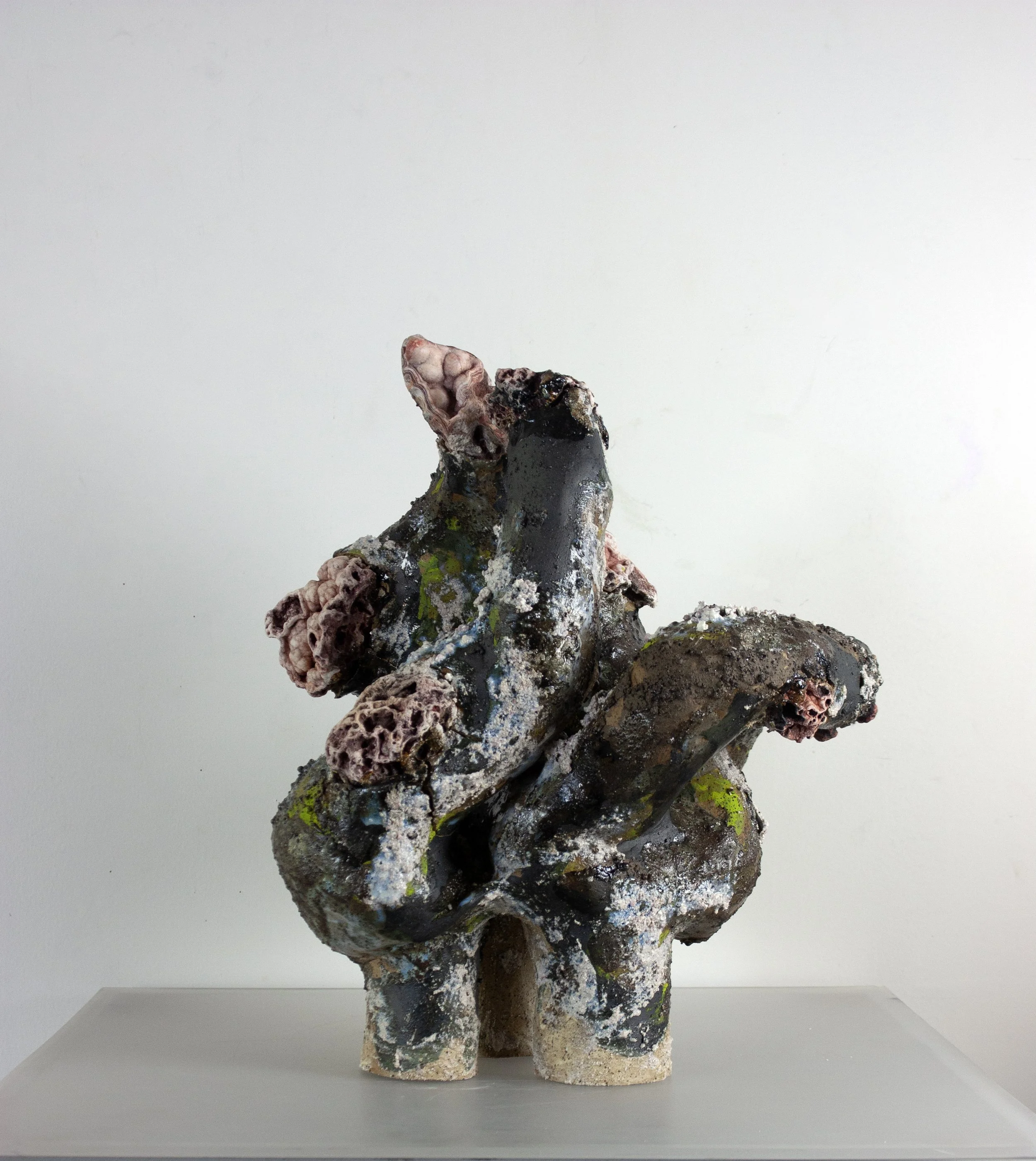 "To Offer Up a Grain Of Sand," 2023. Crushed pink Ozark gravel, melted stone, found Huzzah Valley rocks, steel glaze, ceramic.