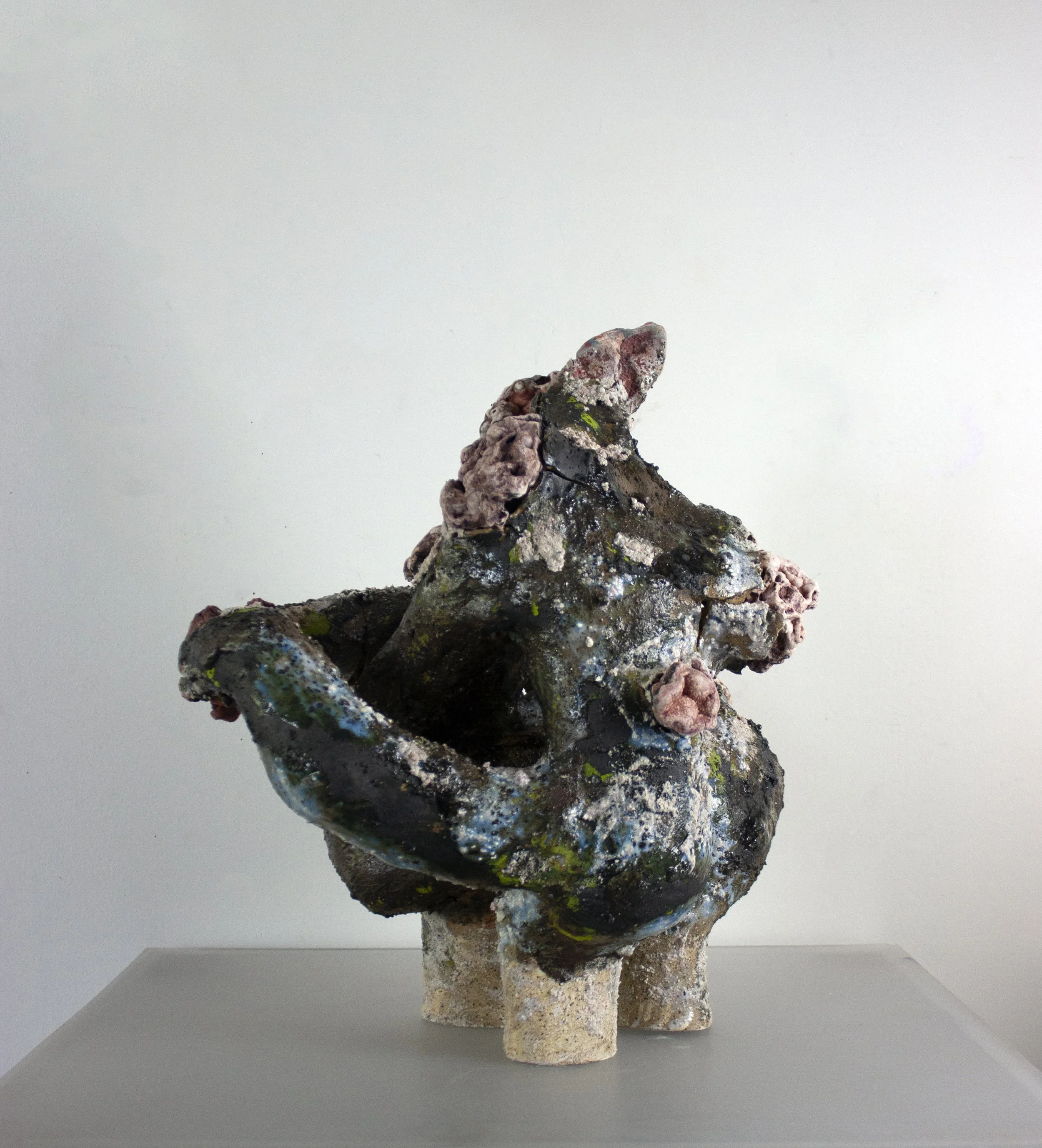 "To Offer Up a Grain Of Sand," 2023. Crushed pink Ozark gravel, melted stone, found Huzzah Valley rocks, steel glaze, ceramic.