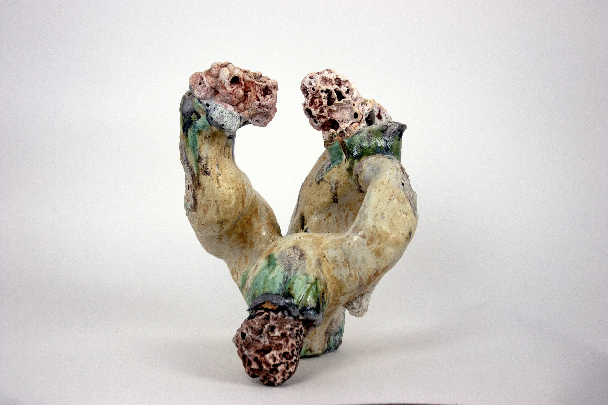 Pillars of Creation, 2023. Ozark Mountain stones, crushed rock, clay, glazes. 21 x 17 x 17 inches.