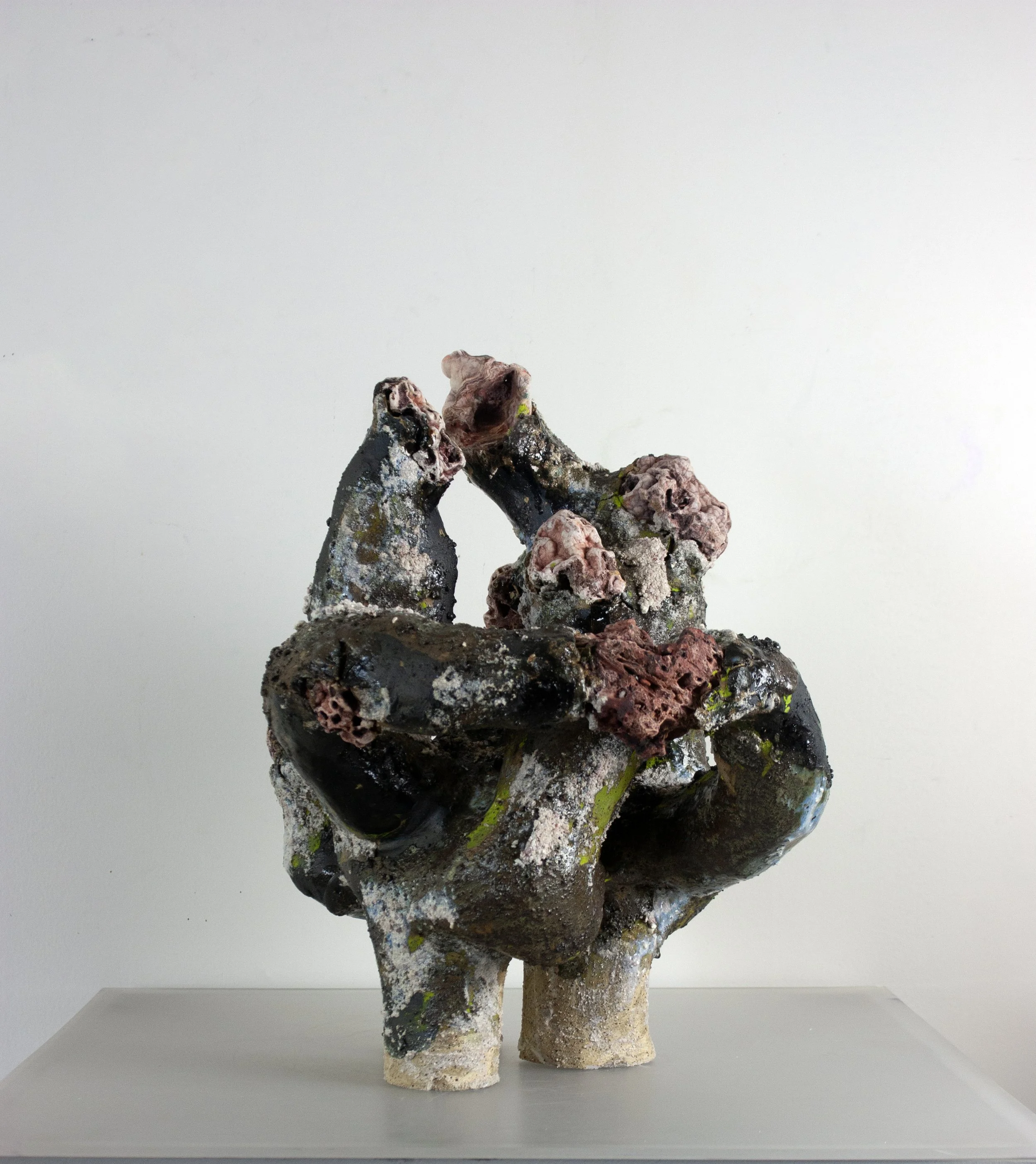 "To Offer Up a Grain Of Sand," 2023. Crushed pink Ozark gravel, melted stone, found Huzzah Valley rocks, steel glaze, ceramic.