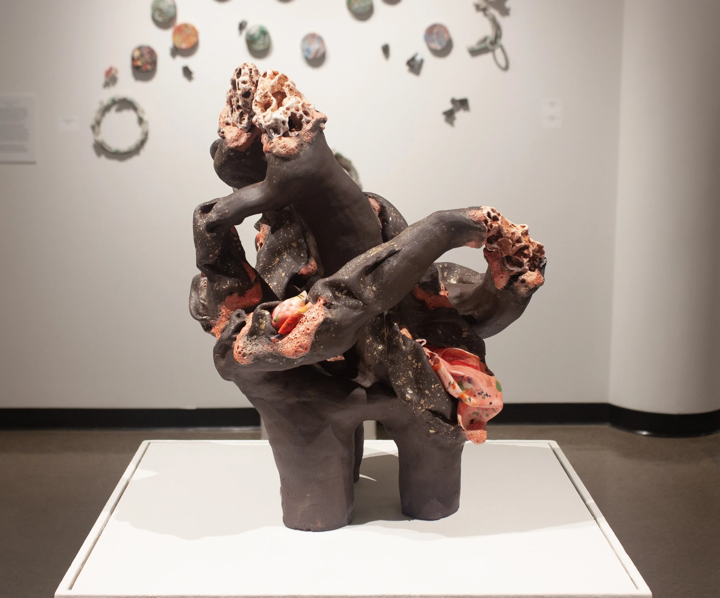 "Slime Mold Ball Gown," 2025. Ozark Druzy quartz, porcelain shards, black stoneware, mica flakes, glaze. 24 x 21 x 18 inches. 