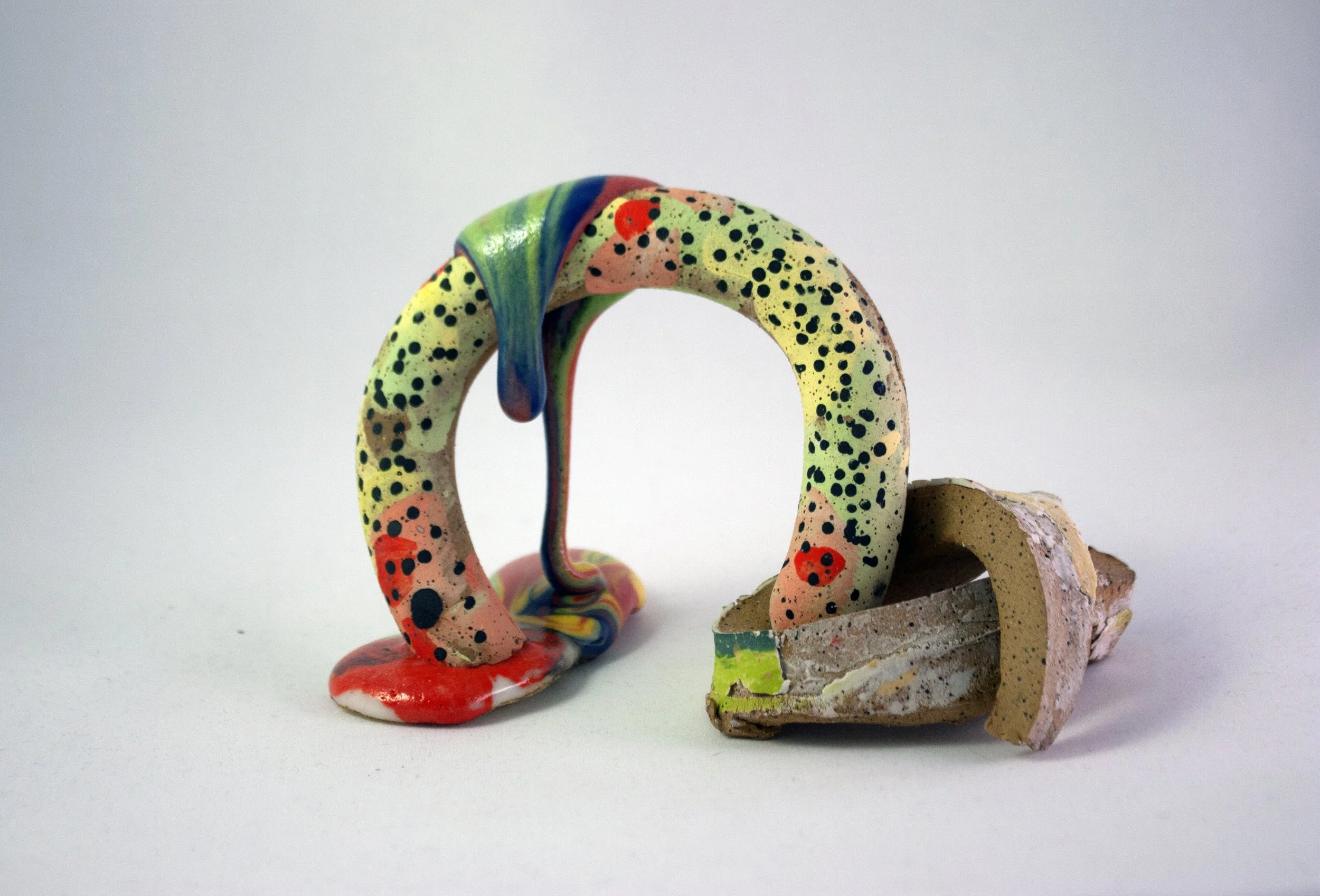 (SOLD) Arch, 2023. Ceramic, underglaze, glaze, scrap bisqueware. Approx. 7.5 x 5 x 4 inches.