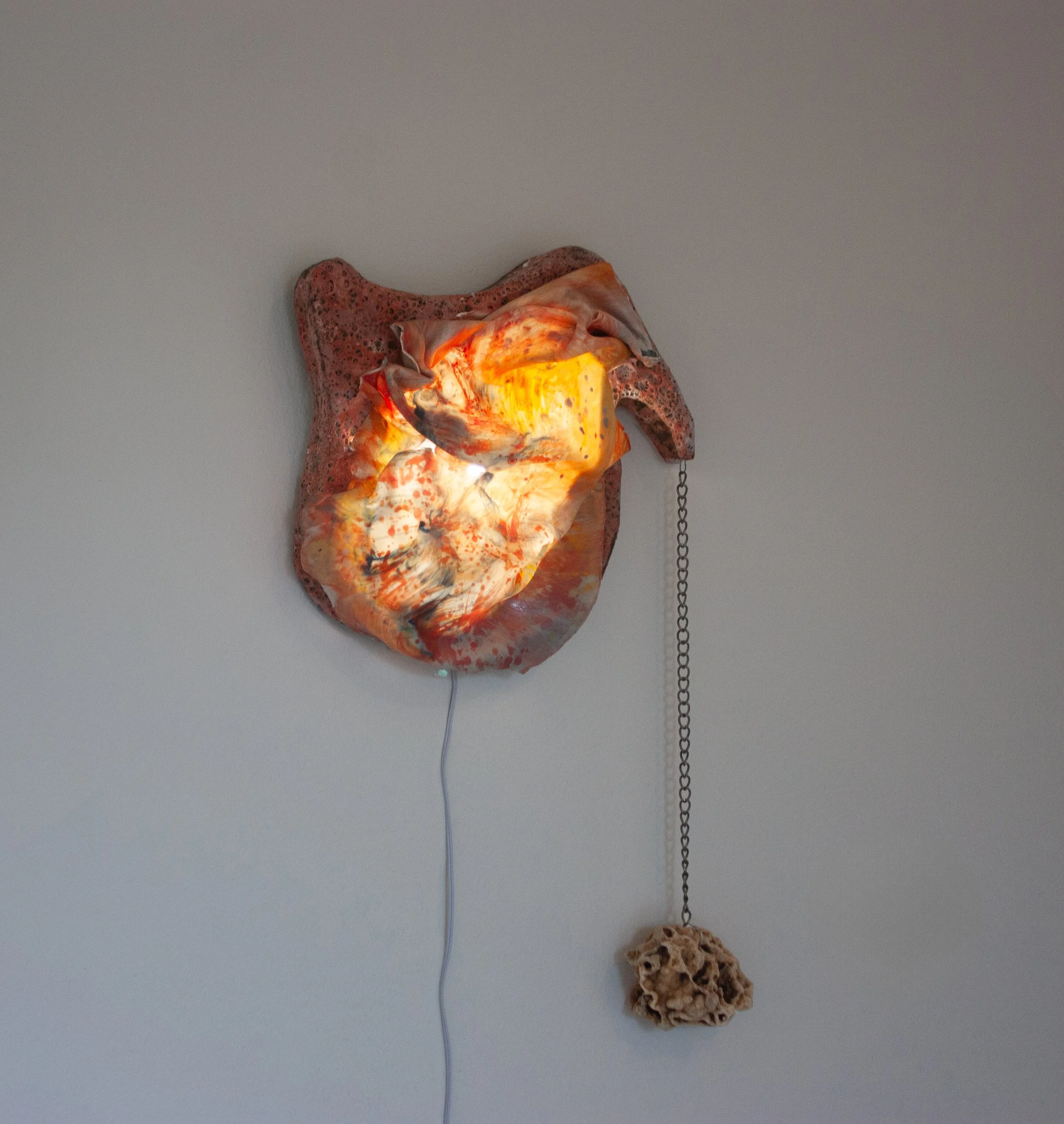 "Radiant Aberrance 1" 2024. Translucent porcelain, Ozark druzy quartz, stoneware, glaze, lighting. 