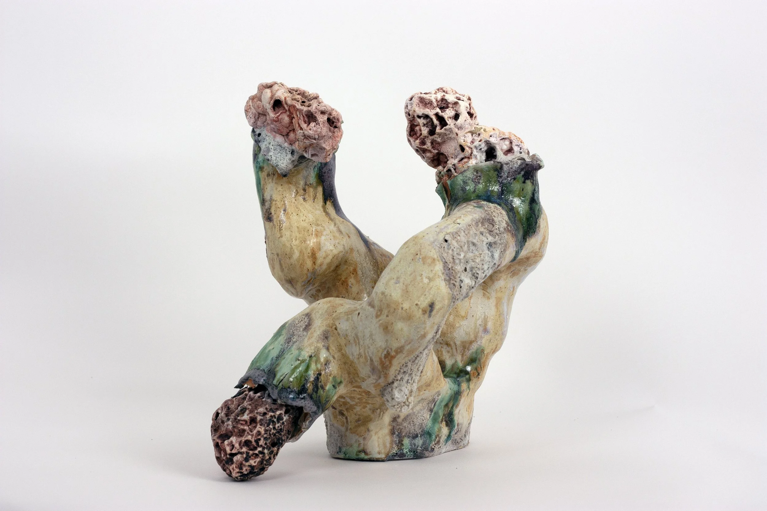 Pillars of Creation, 2023. Ozark Mountain stones, crushed rock, clay, glazes. 21 x 17 x 17 inches.