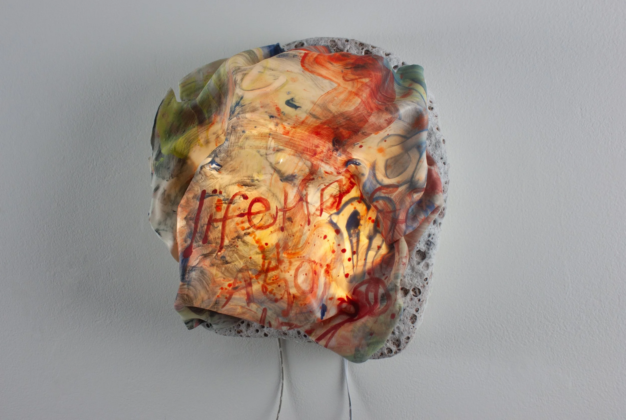 "We had lifetimes to go," 2025. Translucent porcelain, stoneware, glazes, pigment, lighting. 