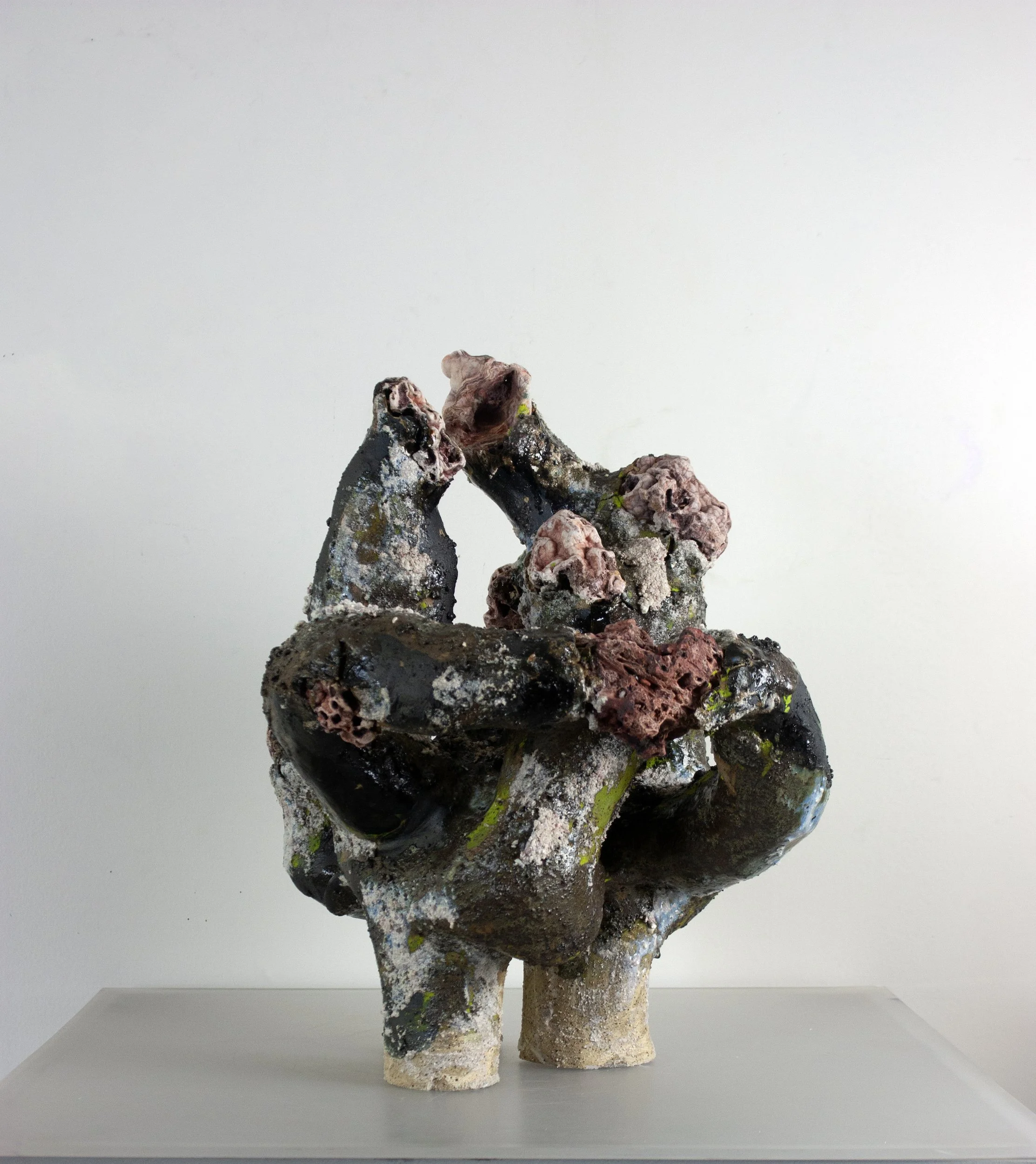 "To Offer Up a Grain of Sand," 2023-2024. 22 x 17 x 14 inches. Ozark druzy quartz, ceramic, foraged clay and gravel, crushed steel, glazes, underglazes, melted stone chunks. Fired ^6 oxidation.