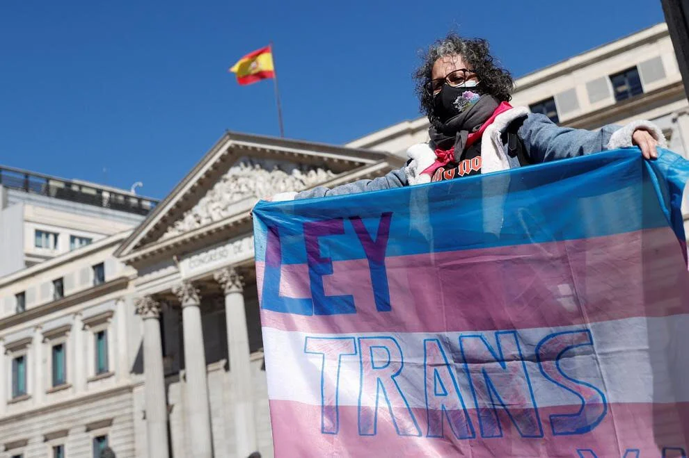 Photo Credits:  AGENCIA EFE  &nbsp;  Trans activist in front of the « Congreso de los Diputados » (the Spanish House of Commons)