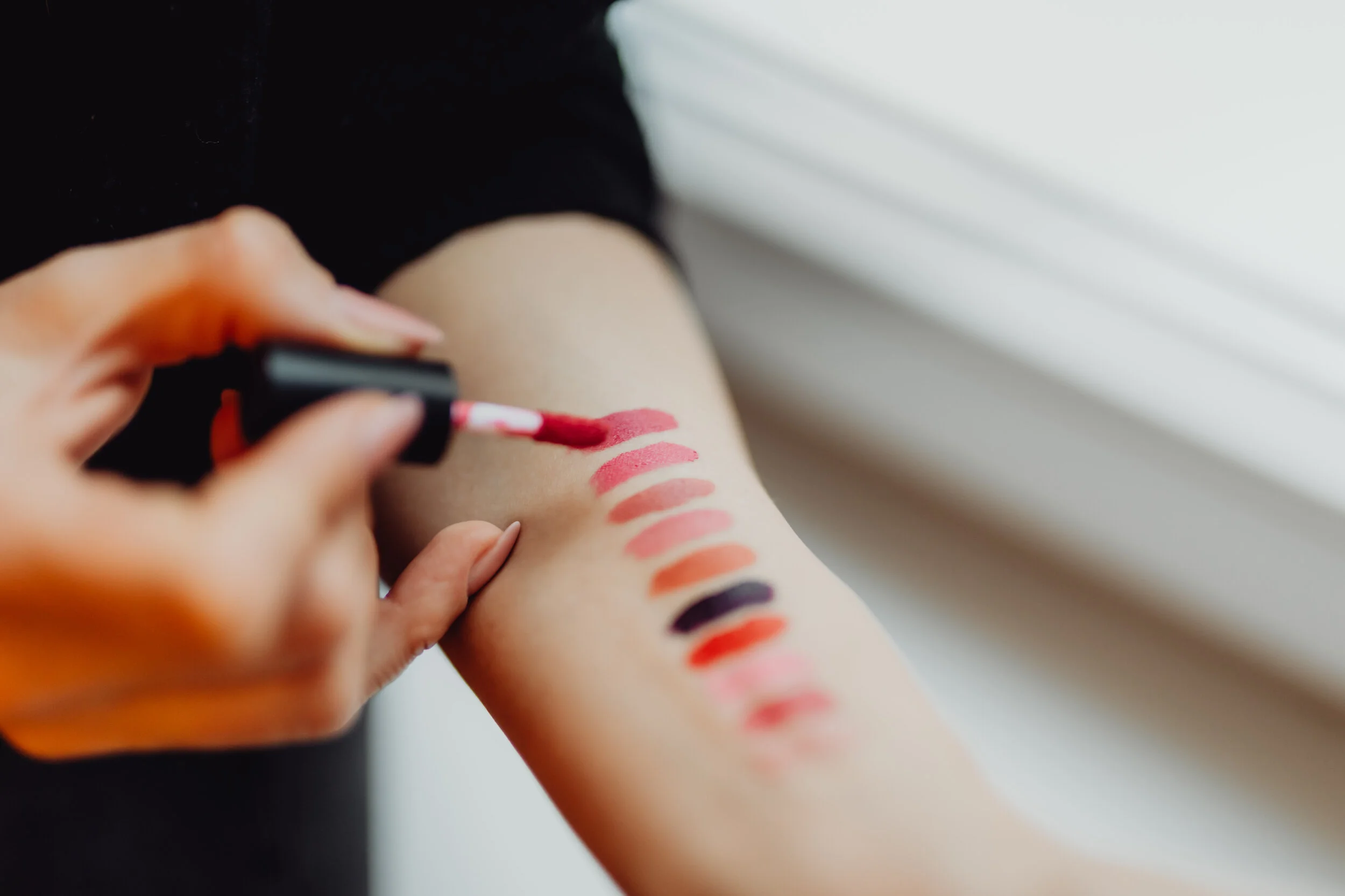 kaboompics_Lipstick swatches on woman hand.jpg