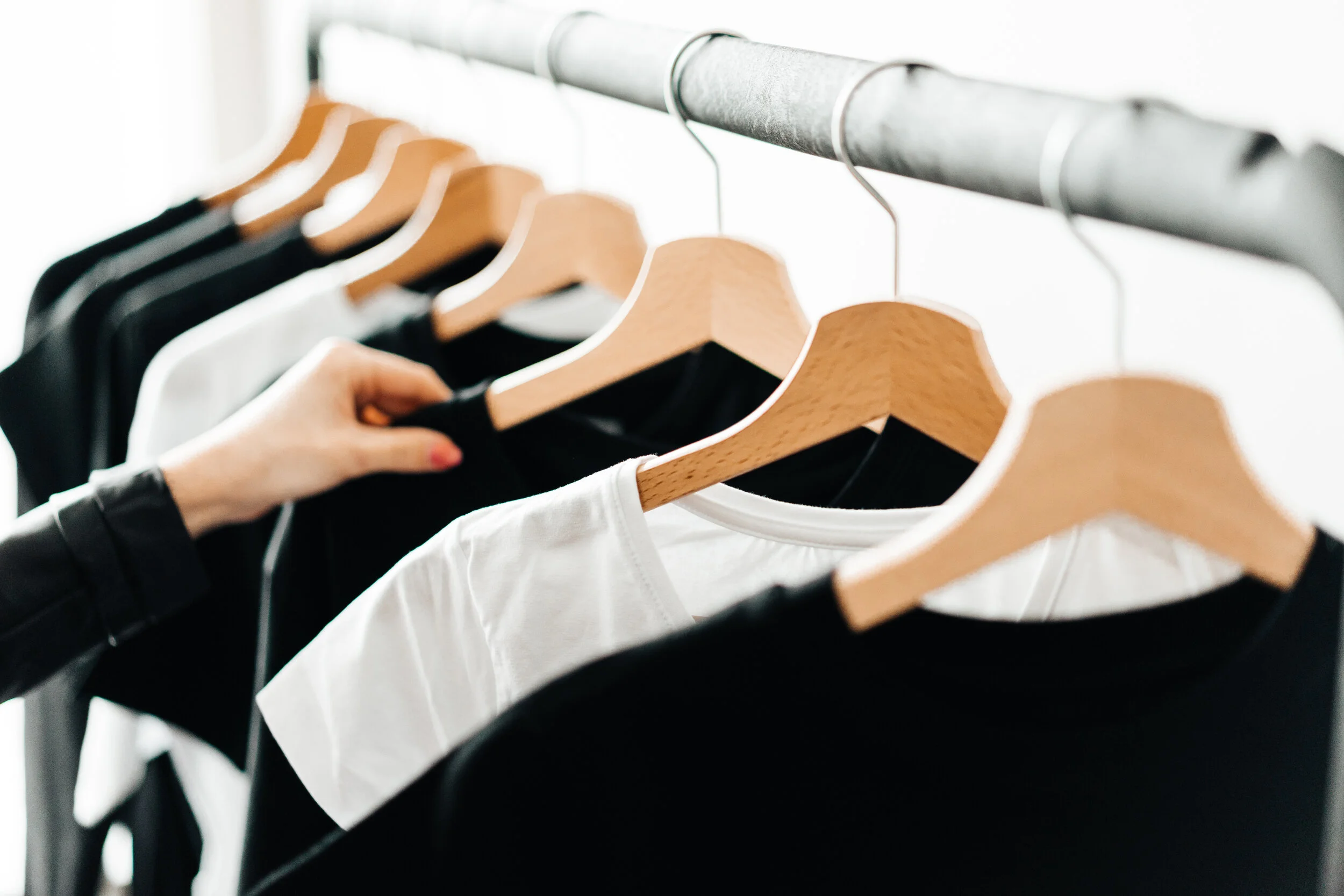 woman-choosing-t-shirts-during-clothing-shopping-at-apparel-store-2-picjumbo-com.jpg