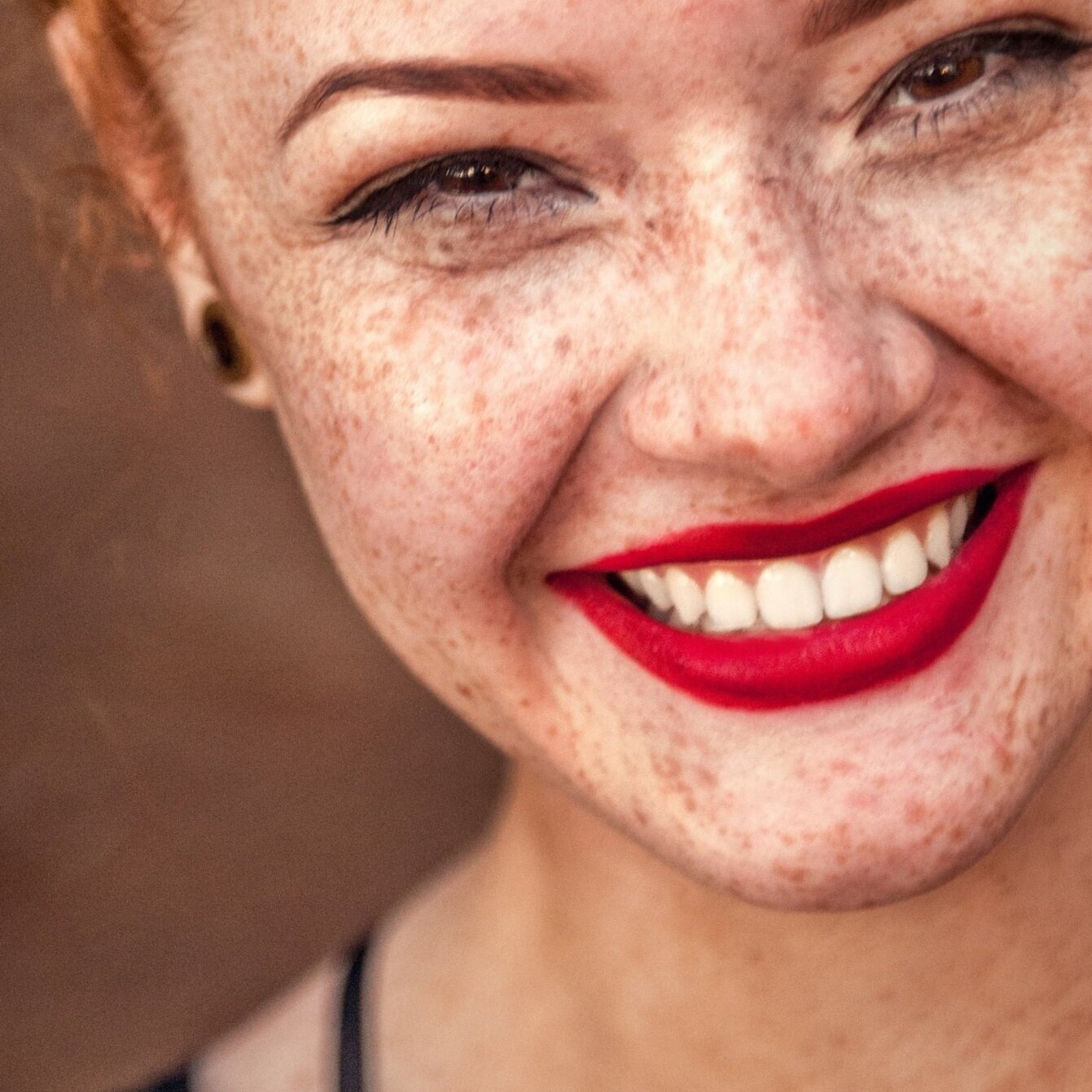  Close-up photo of woman’s face. 