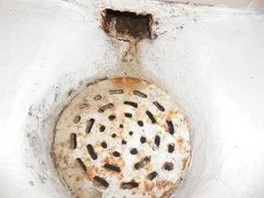 Foundation drain discharging into sanitary floor drain