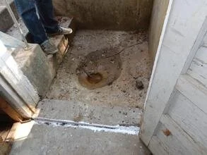 Stairwell drain connected to the sanitary system