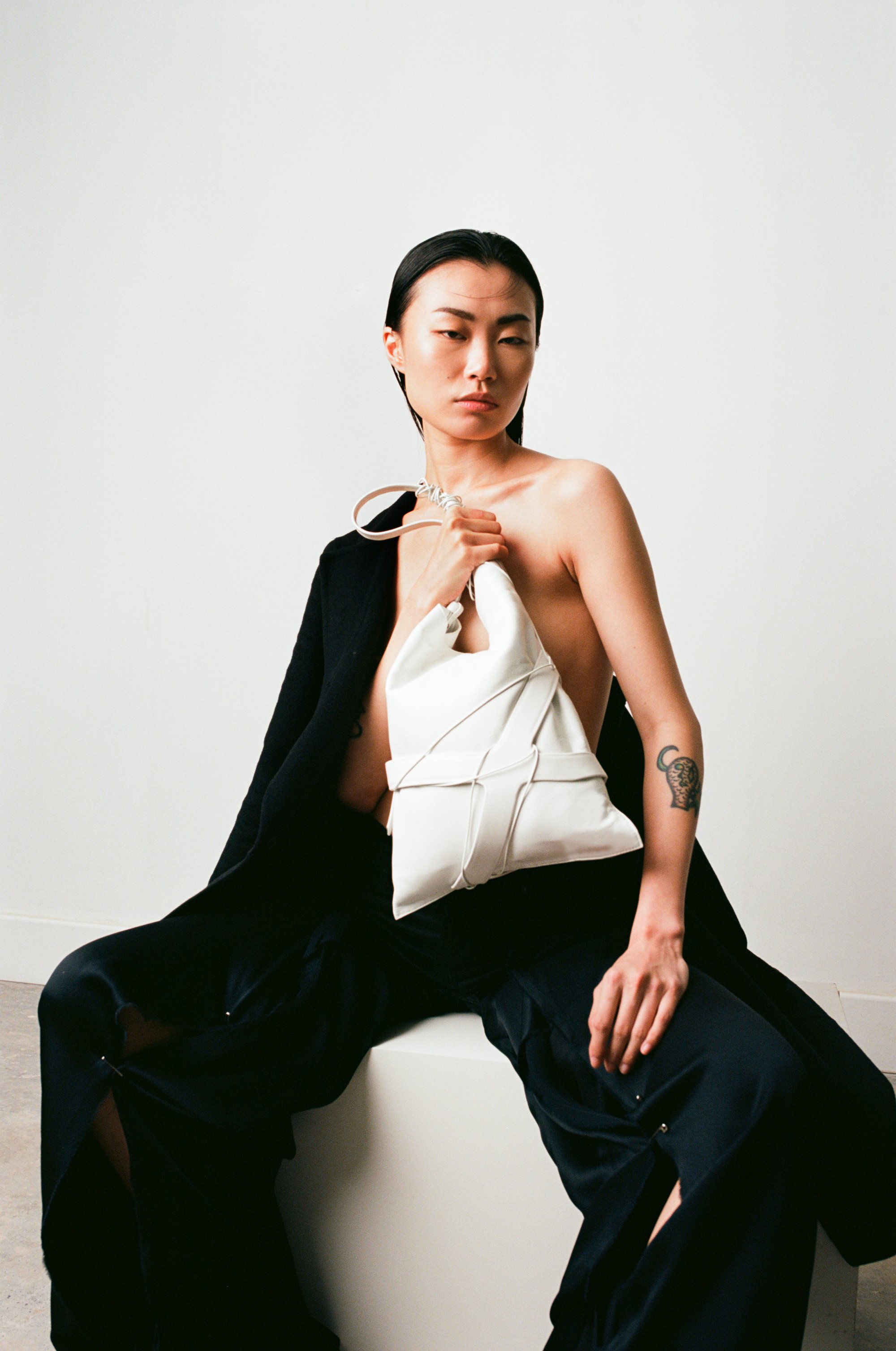 Kikiito-houseofito-sanagi-white-leather-tote-handbag-bag-made-in-England-Uk-craftsmanship-handmade-avantgarde-Japanese-London-accessories-minimalist-design-sustainable-slow-fashion-brand-one-of-a-kind-editorial-photoshoot-model-Po-Hsuan.jpg