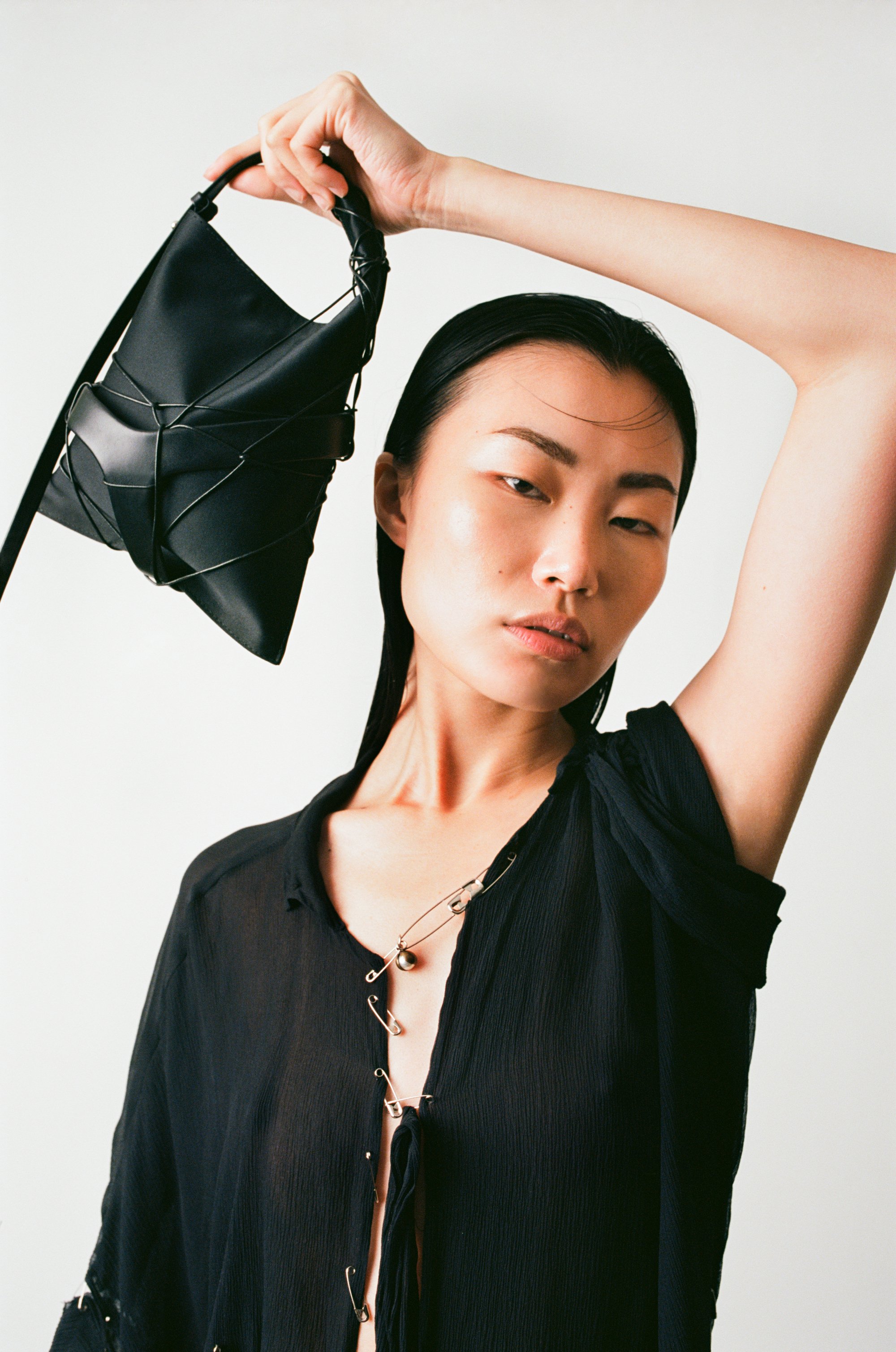 Kikiito-houseofito-sanagi-mini-black-leather-silk-handbag-bag-made-in-England-Uk-styling-craftsmanship-handmade-avantgarde-Japanese-London-accessories-minimalist-design-sustainable-slow-fashion-brand-one-of-a-kind-editorial-photoshoot-model-Po-Hsuan.jpg
