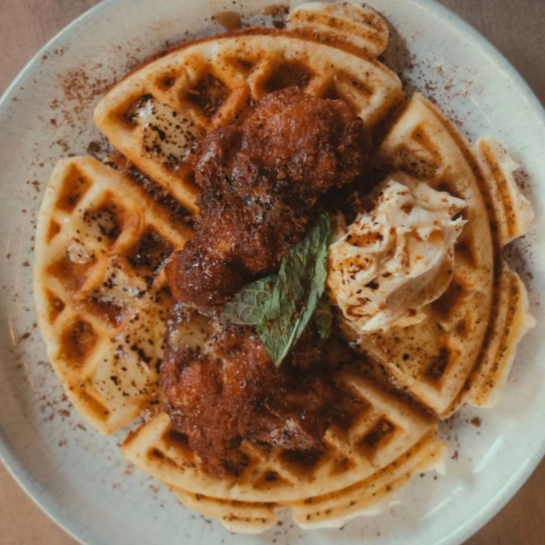 Our chicken &amp; waffles. A perfect balance of savoury and sweet with maple mascarpone, lemon curd, maple syrup, coffee, mint &amp; fresh waffle.

📸 @cam_mark