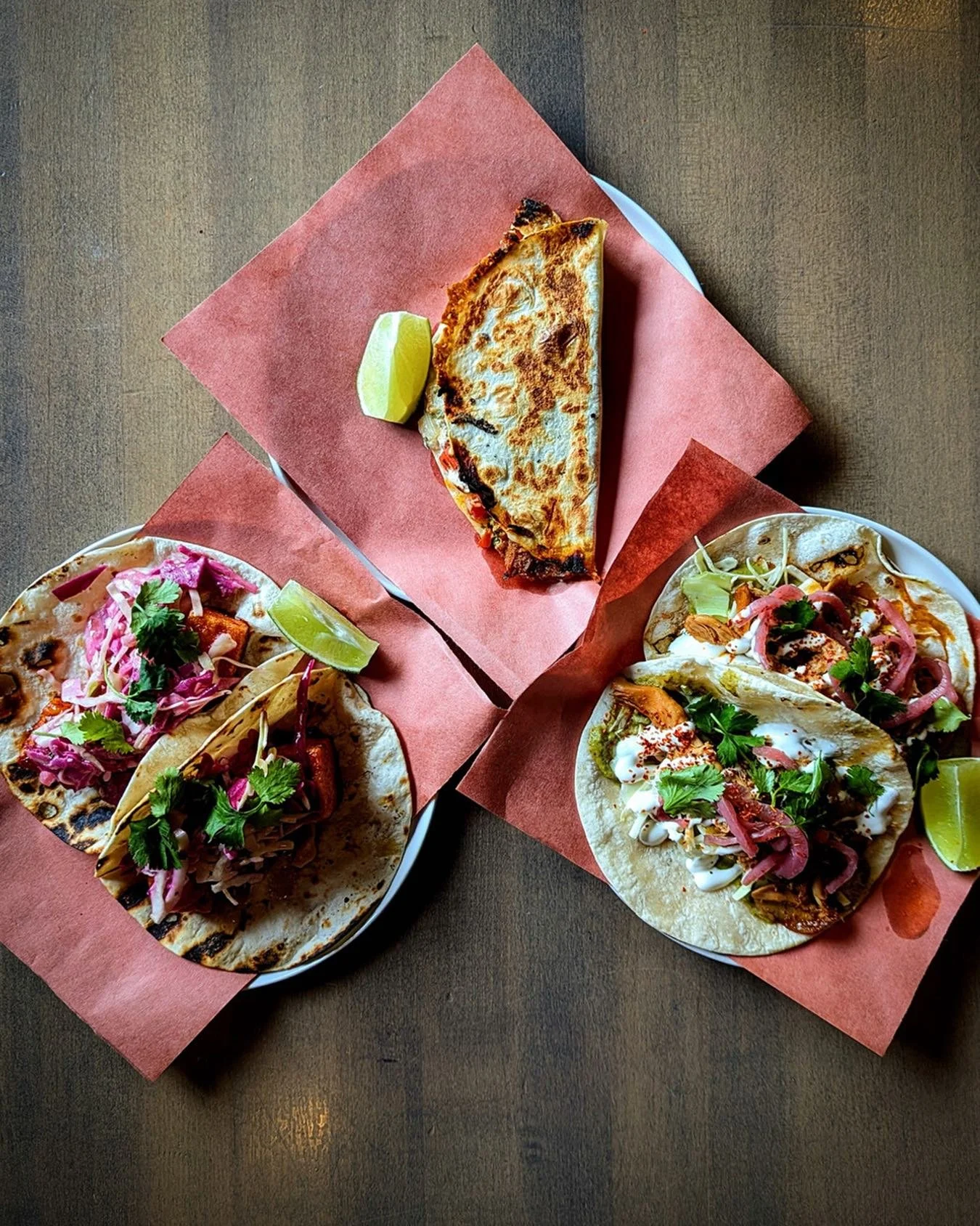 IT&rsquo;S TACO TIME! 🤤🌮

Clockwise (from left)&hellip;

KOREAN BBQ TOFU
With slaw, garlic lemon aioli, sesame oil, cilantro 

PULLED PORK QUESADILLA 
With chipotle tomato bbq sauce, sour cream, house made pico 

TEQUILA LIME CHICKEN
With zucchini 