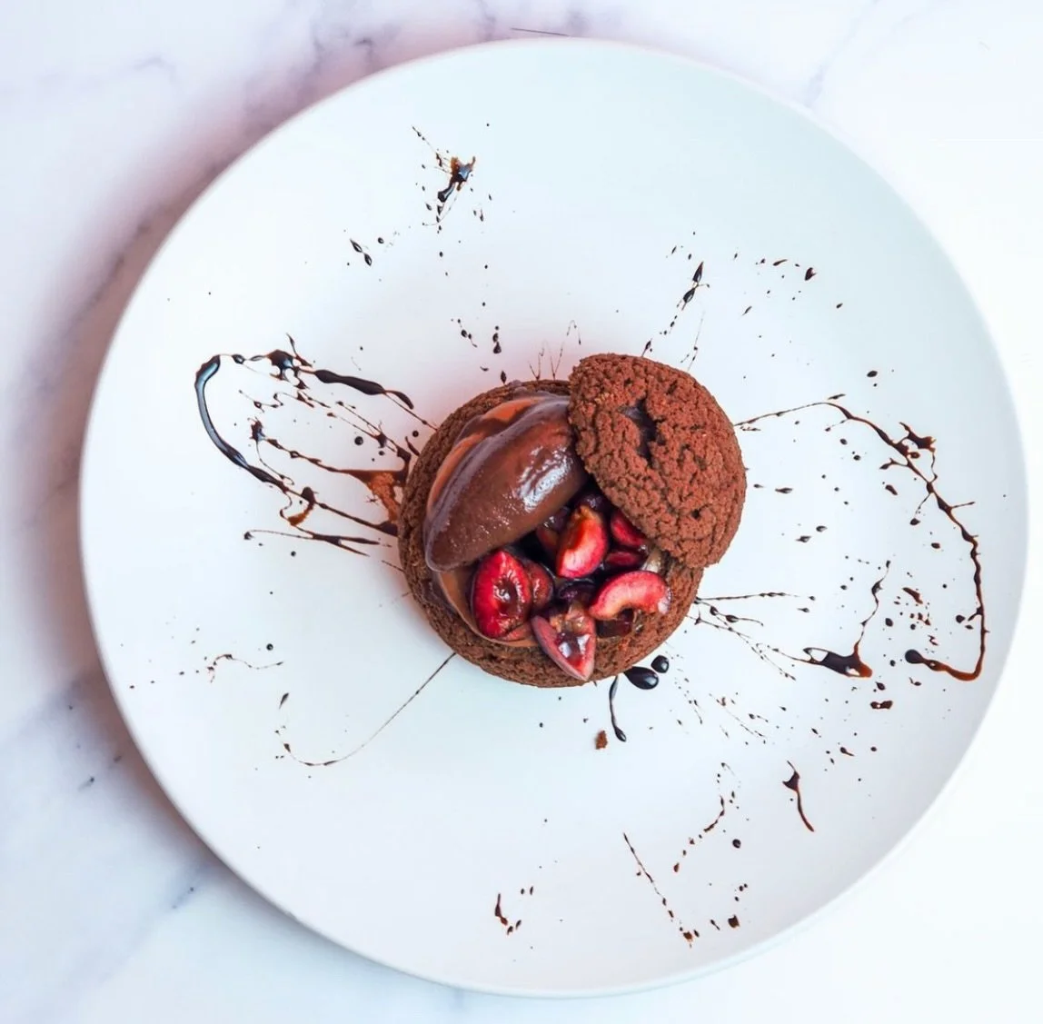 Cherry and chocolate: yes or no? 🍒🍫

I absolutely love this combination! It&rsquo;s one of those classic pairings that never gets old.

A while ago, I created this plated dessert featuring:

* Chocolate Sauce
* Cocoa and Nutmeg Choux
* Whipped Choc