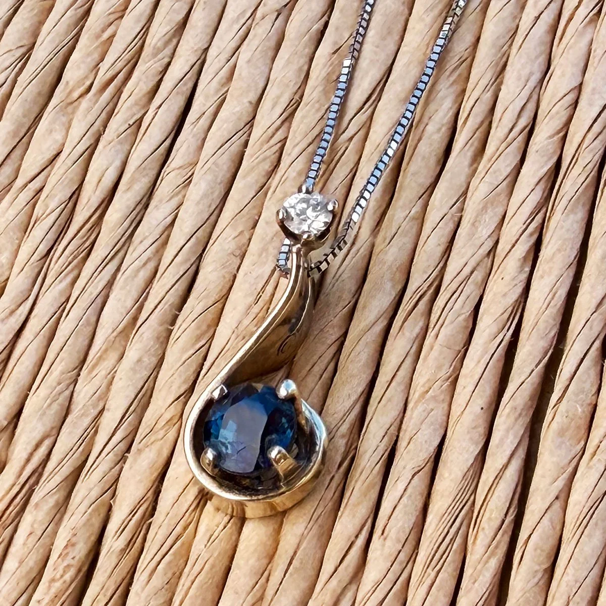 Midnight Blue Sapphire & Diamond Ribbon Pendant in 14K White Gold