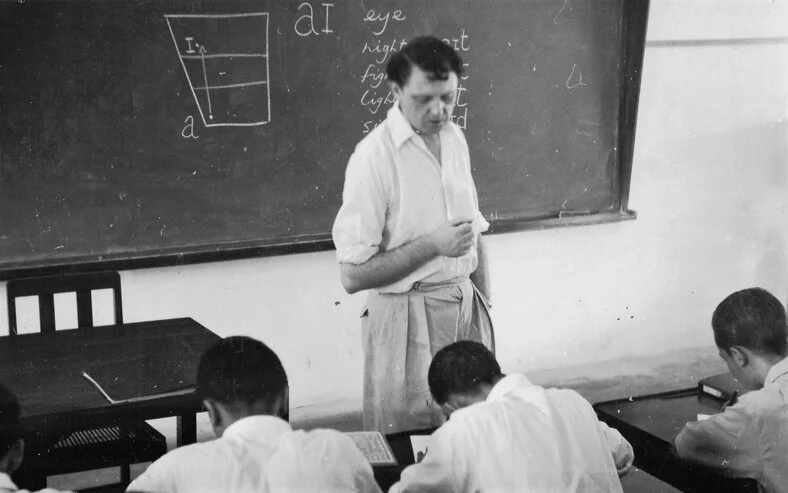 Burgess teaching English at MCKK.