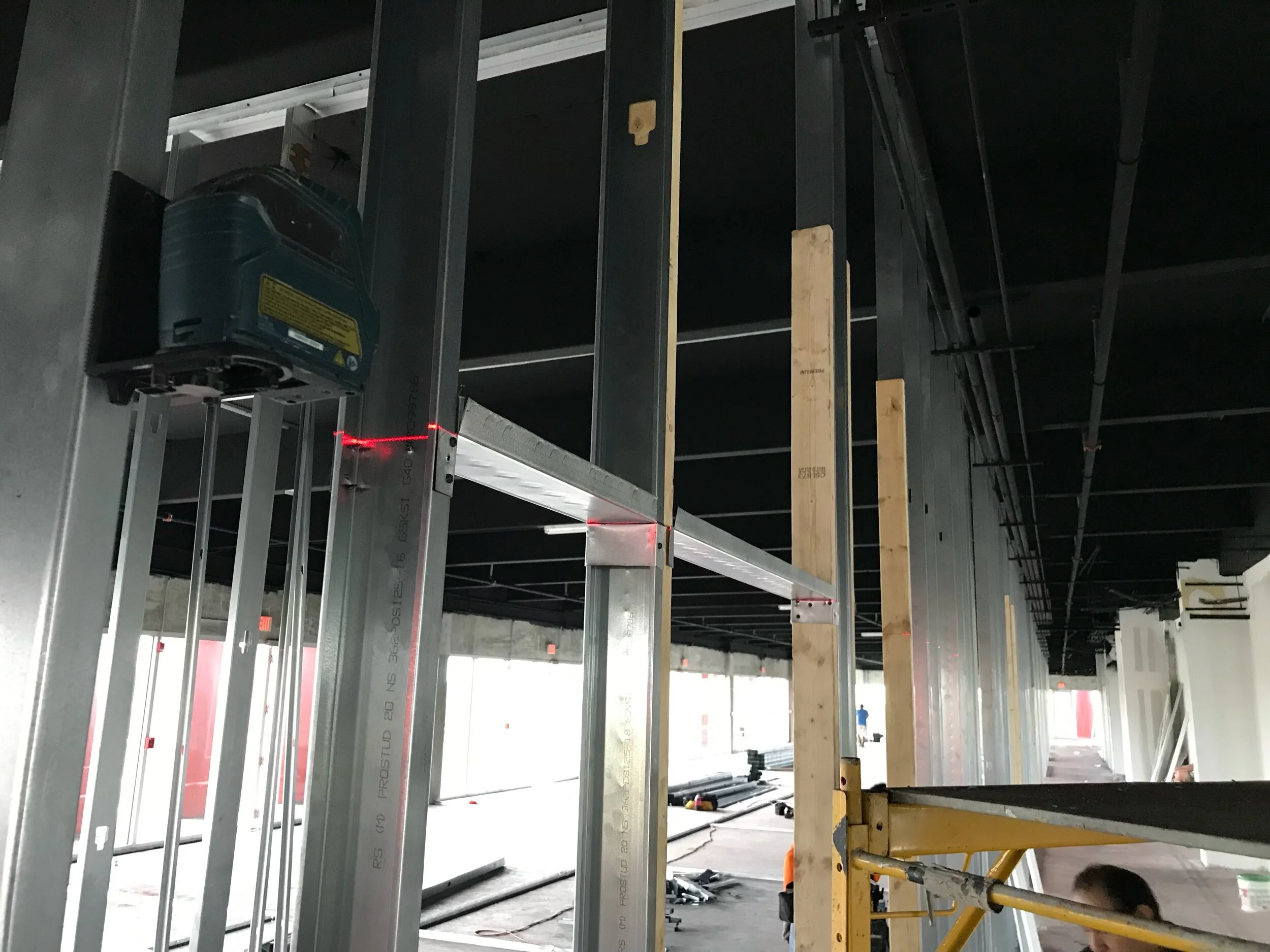 Construction with laser for professional builder finish