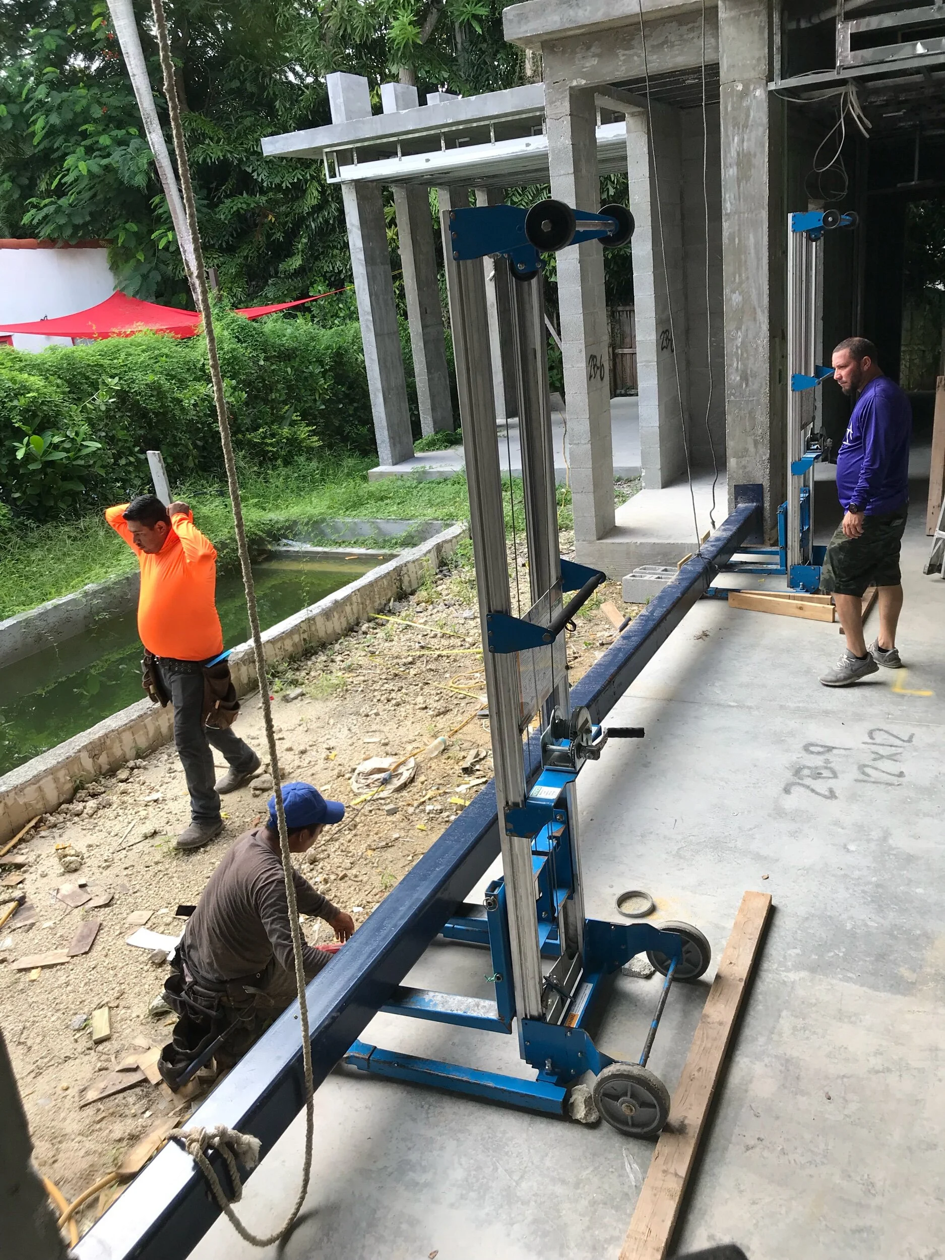 General Contractor installing steel beam