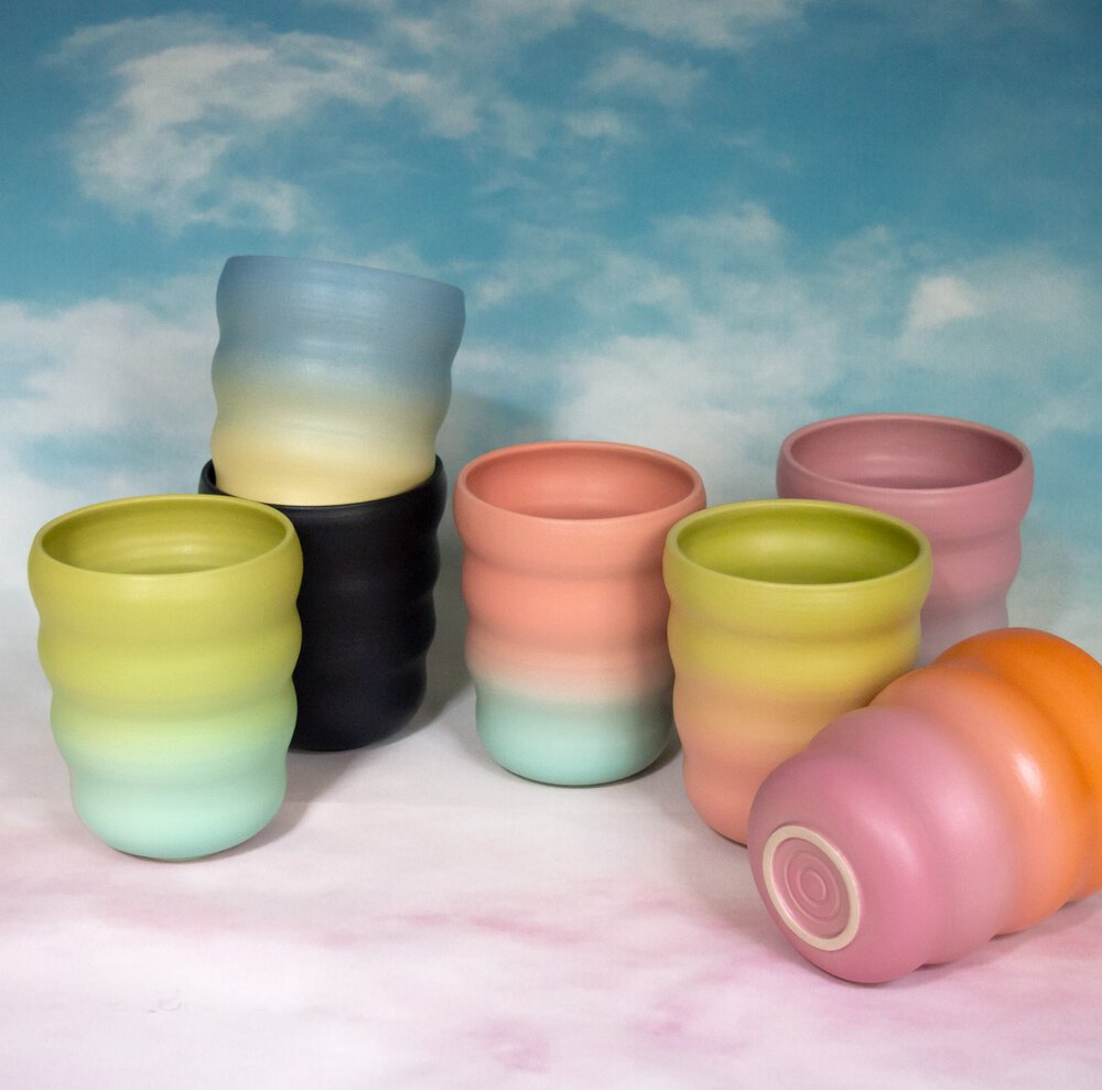 Collection of handmade zoom cups by ceramicist Marilyne Blais