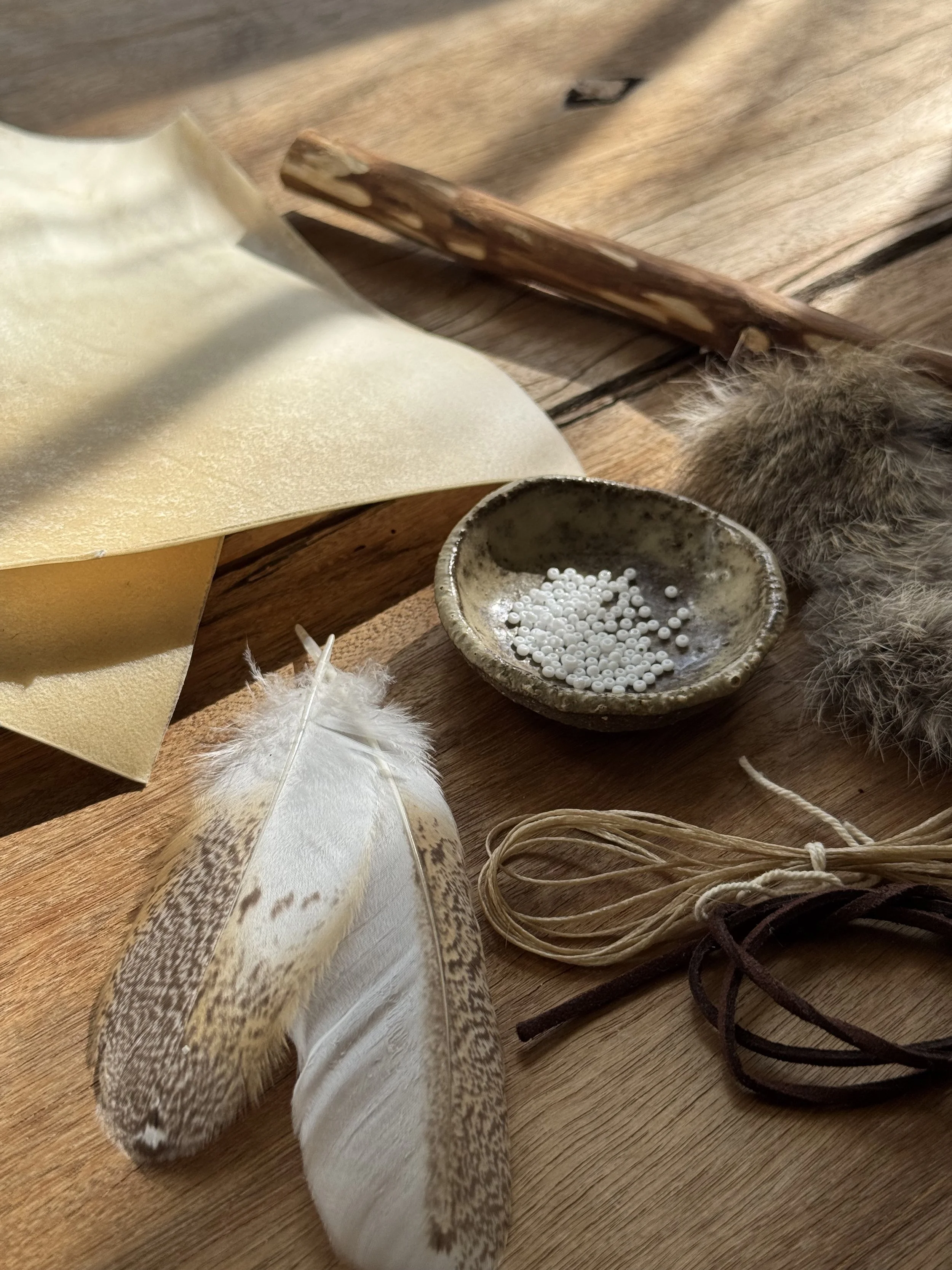 Shamanic rattle crafting materials with deer or kangaroo hide