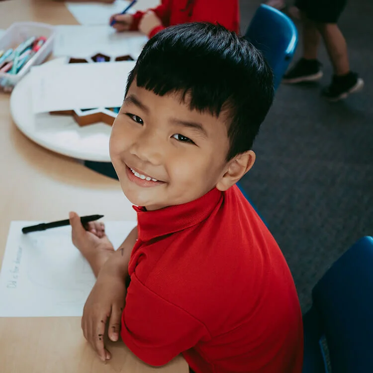 Small boy looking at camera - Square.jpg