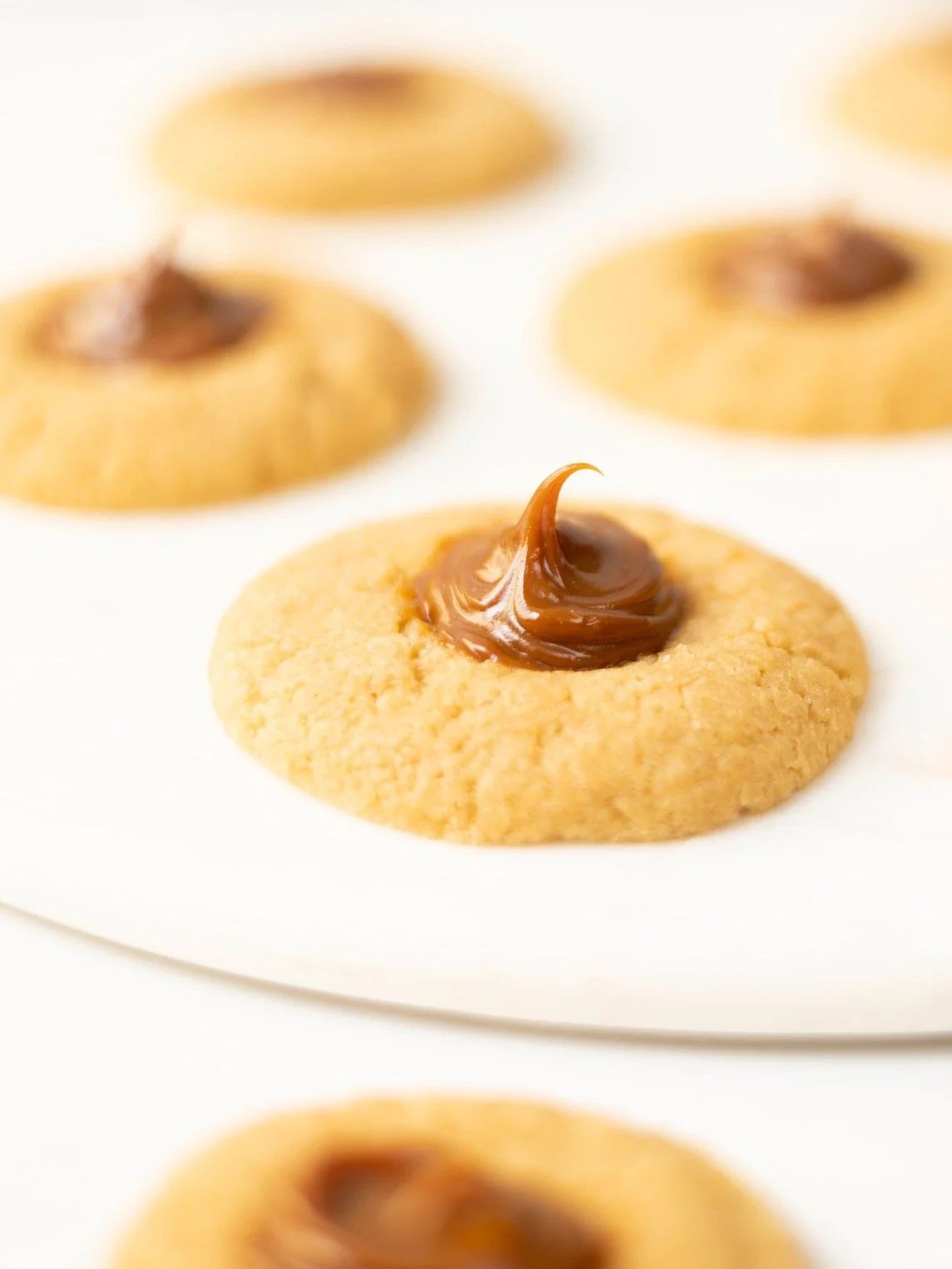 Tahini Thumbprint Cookies with Dulce de Leche
