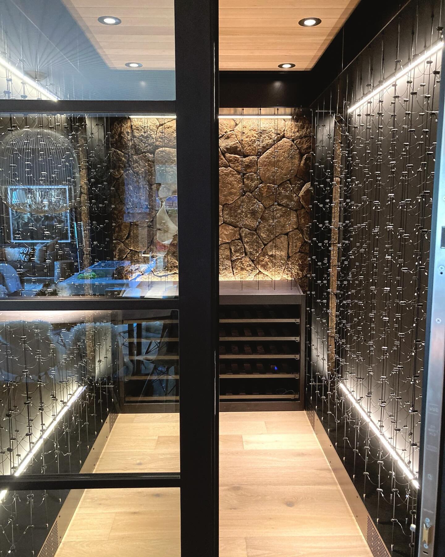 This wine cellar is an absolute show-stopper! The lava rock, which is a main feature of the exterior and fireplace, is also highlighted here. Cannot wait to have this project photographed in all its glory. 

#brokentoplavalove #wine #winecellar #wine