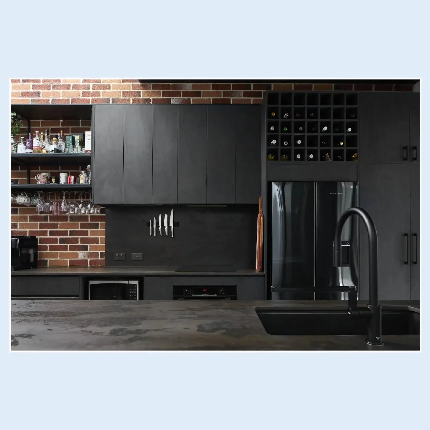 KITCHEN 

Up close in the kitchen at LaneWareHouse. Black ply look melamine panels paired with steel plate style porcelain makes for a simple and bold aesthetic against the red brick double height wall.

👷🏼&zwj;♂️ @mitsanconstruction
📷 @petereller