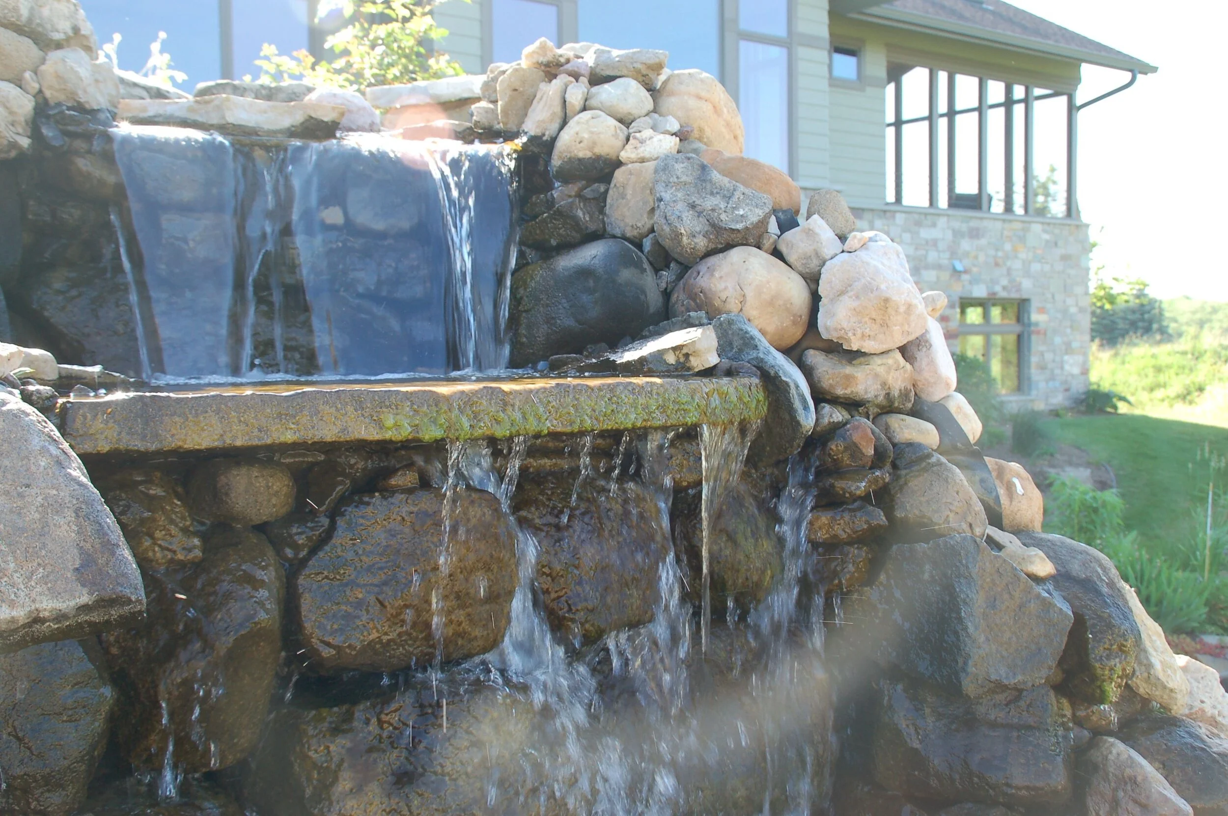 How Water Features Are Incorporated Into Landscaping Near Me in Madison and Middleton, WI