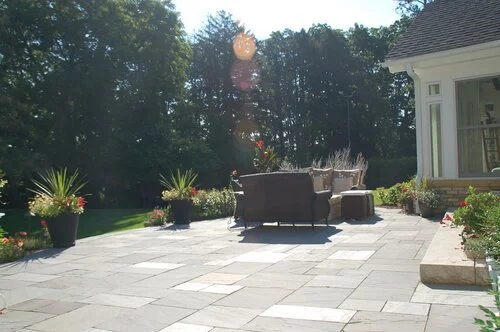 Enjoy a Magic-Like Ambience in Madison, WI When You Have Landscape Lighting Surrounding an Outdoor Fireplace Area